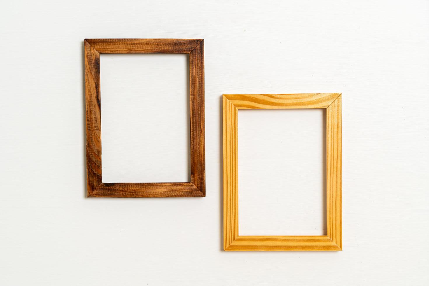 Empty picture frame on white wall background with copy space photo