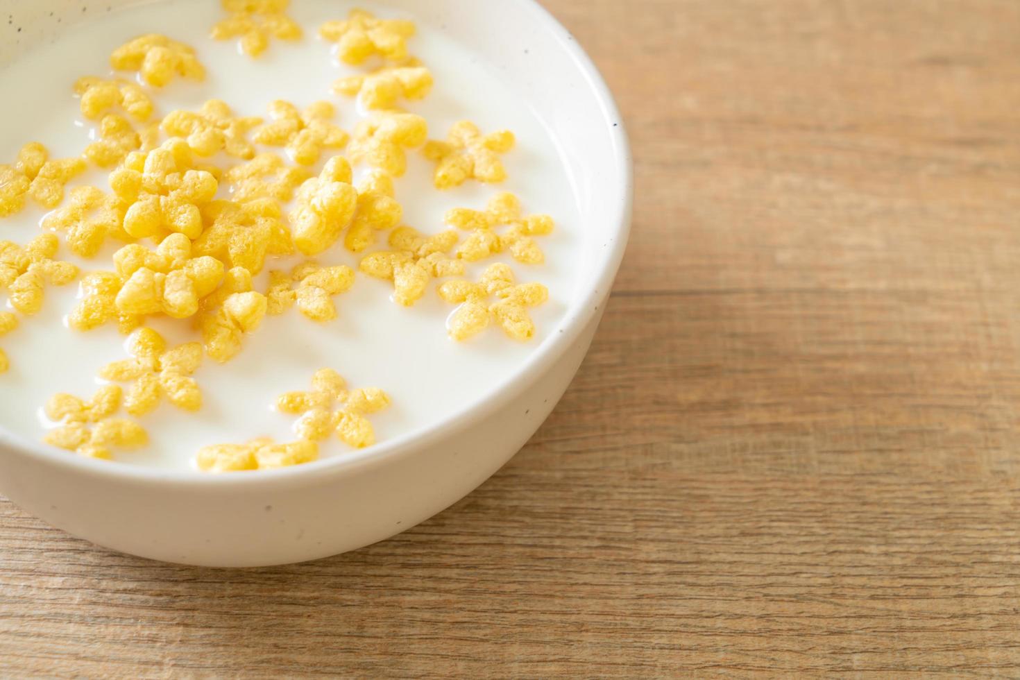 Whole grain cereals with fresh milk for breakfast photo