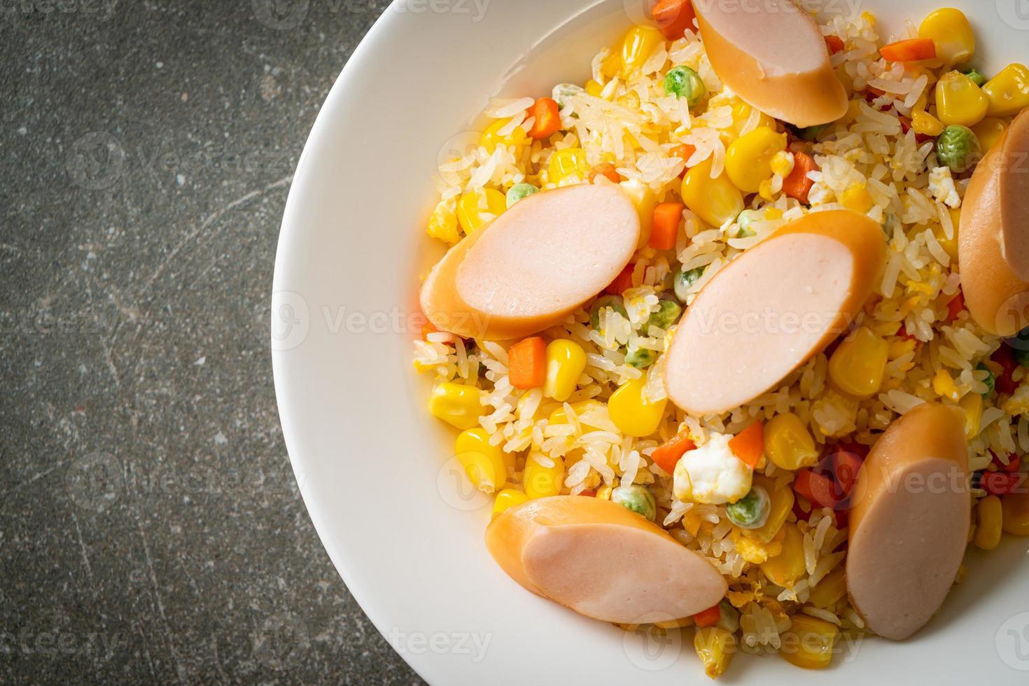 Fried rice with sausage and mixed vegetable photo