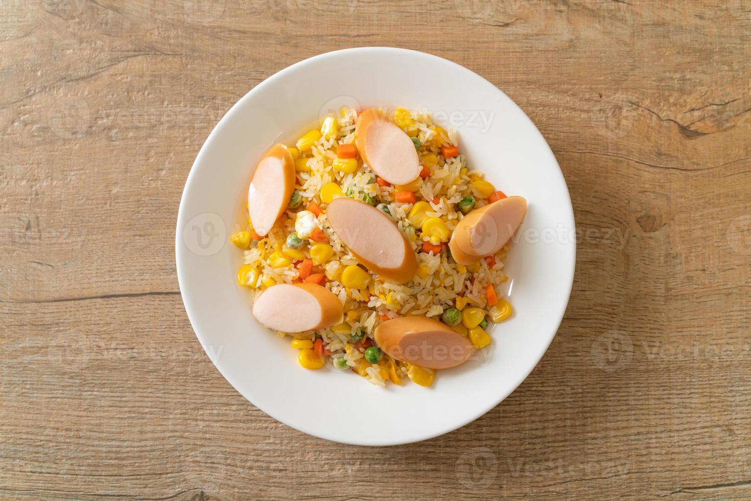 Fried rice with sausage and mixed vegetable photo