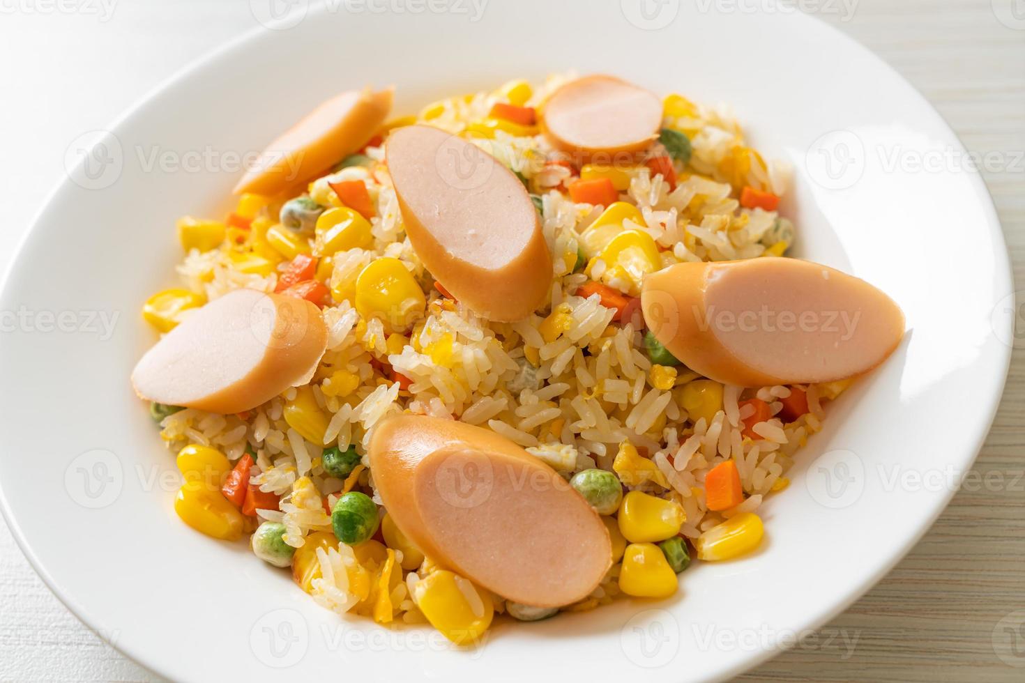 Fried rice with sausage and mixed vegetable photo