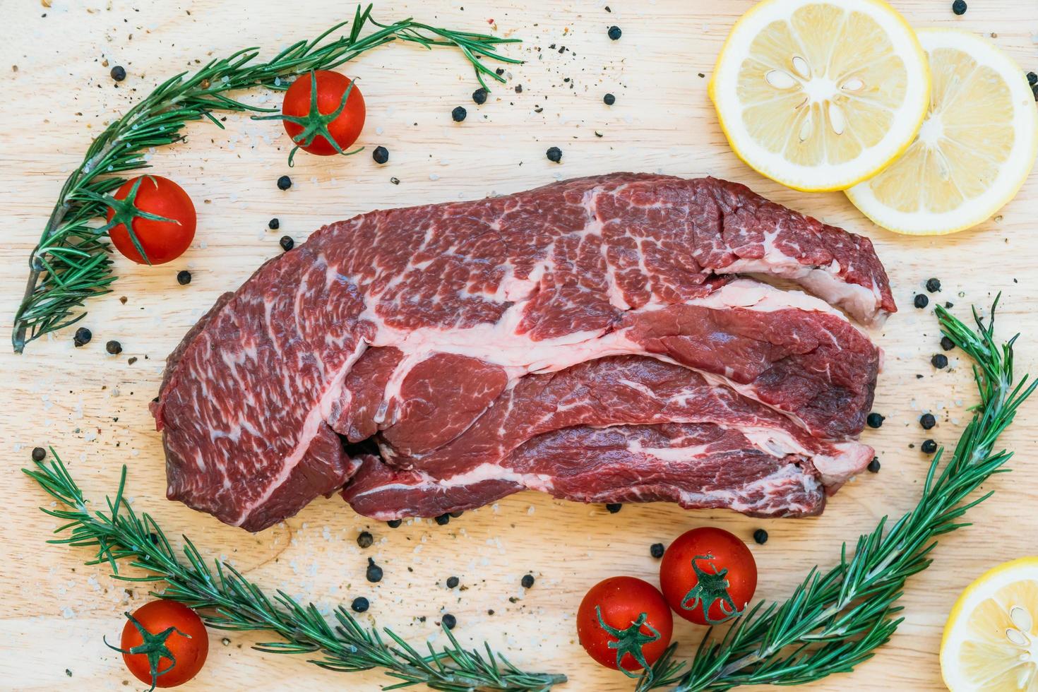 Raw beef meat on cutting board photo