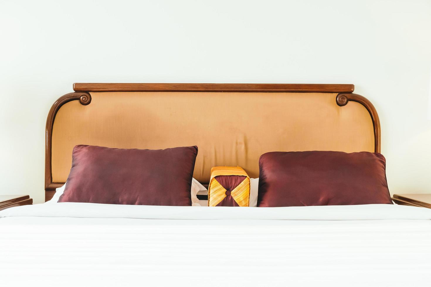 Comfortable pillow on bed photo