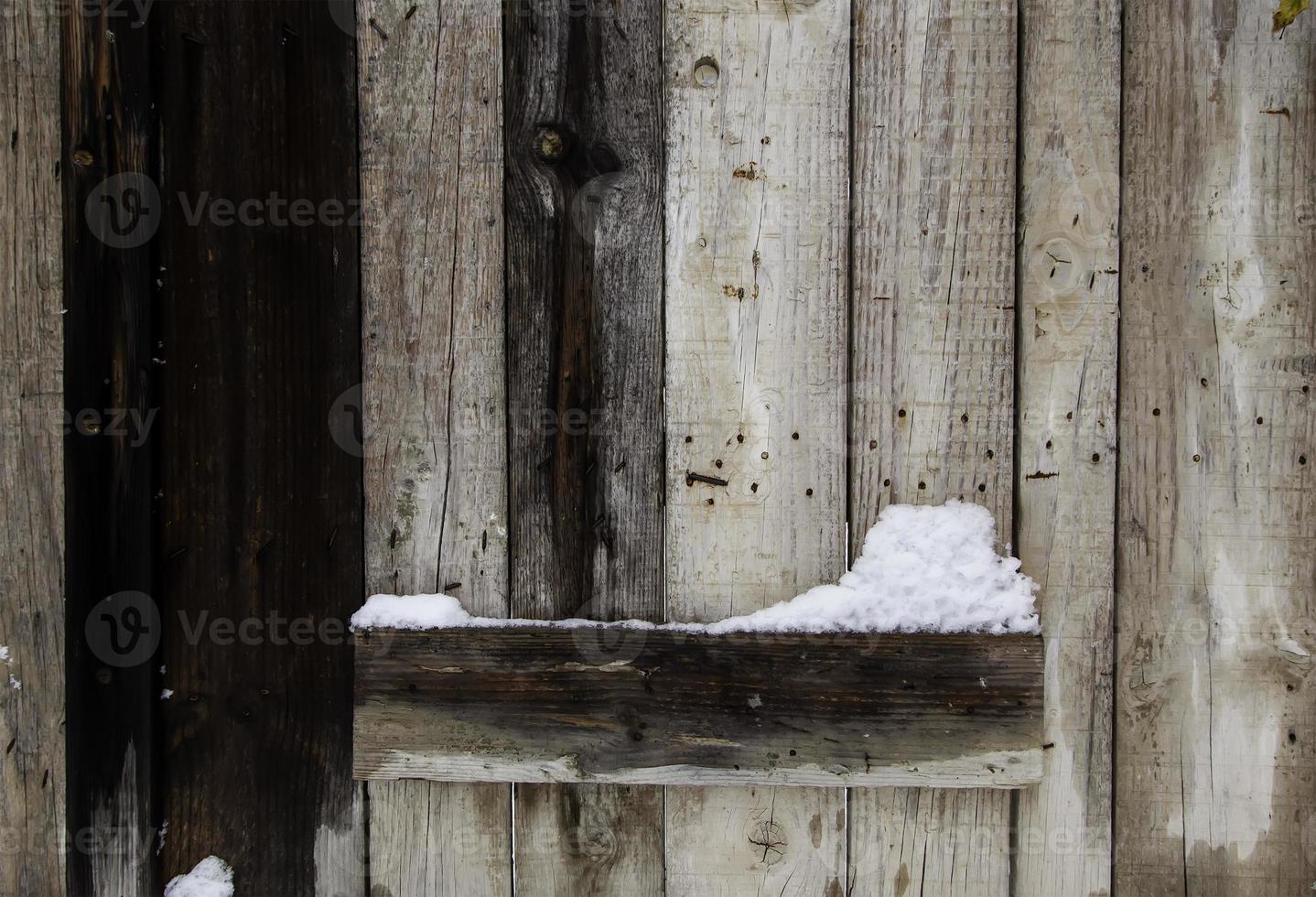 fondo de madera con nieve foto