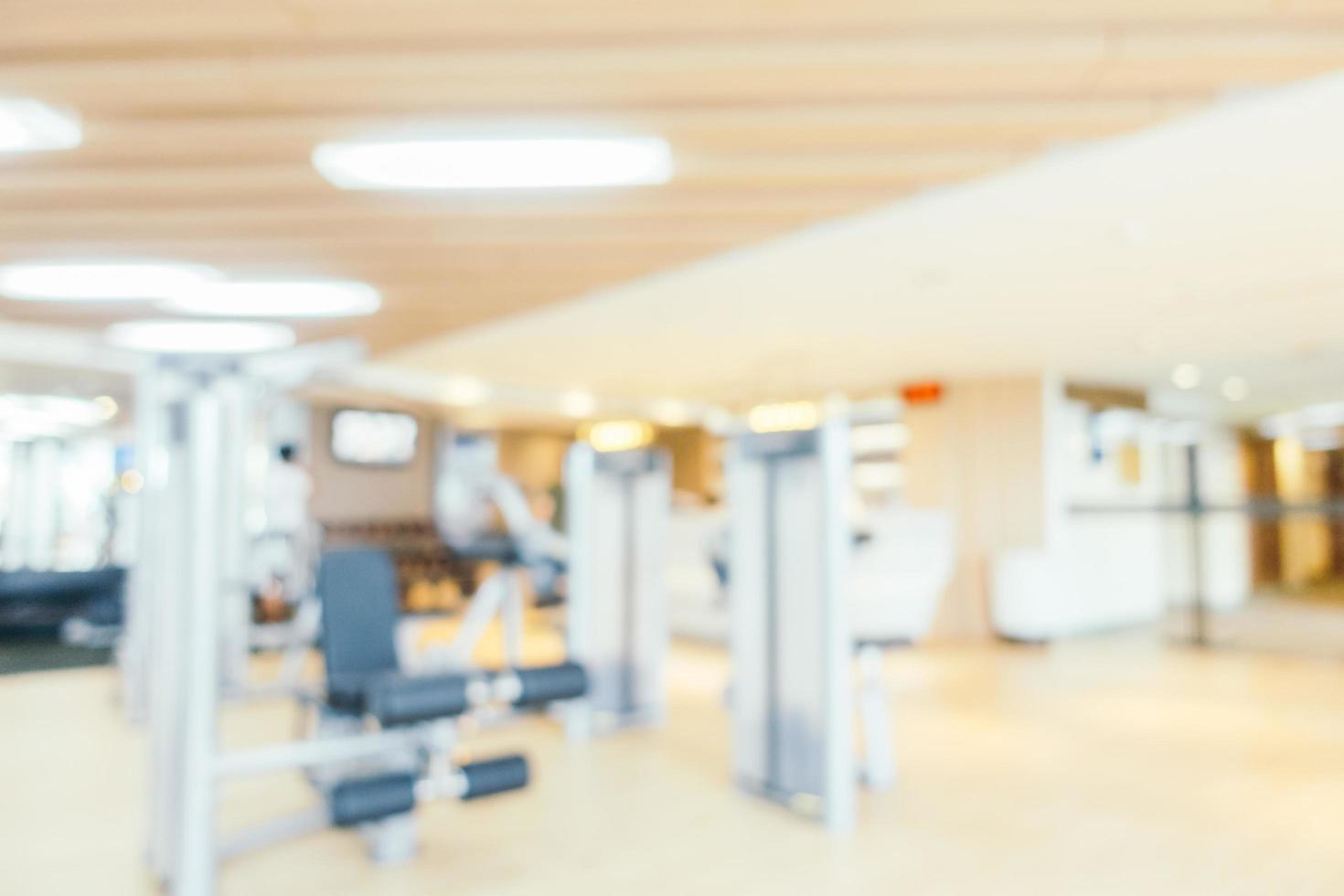 Abstract blur and defocused gym equipment and fitness room interior photo