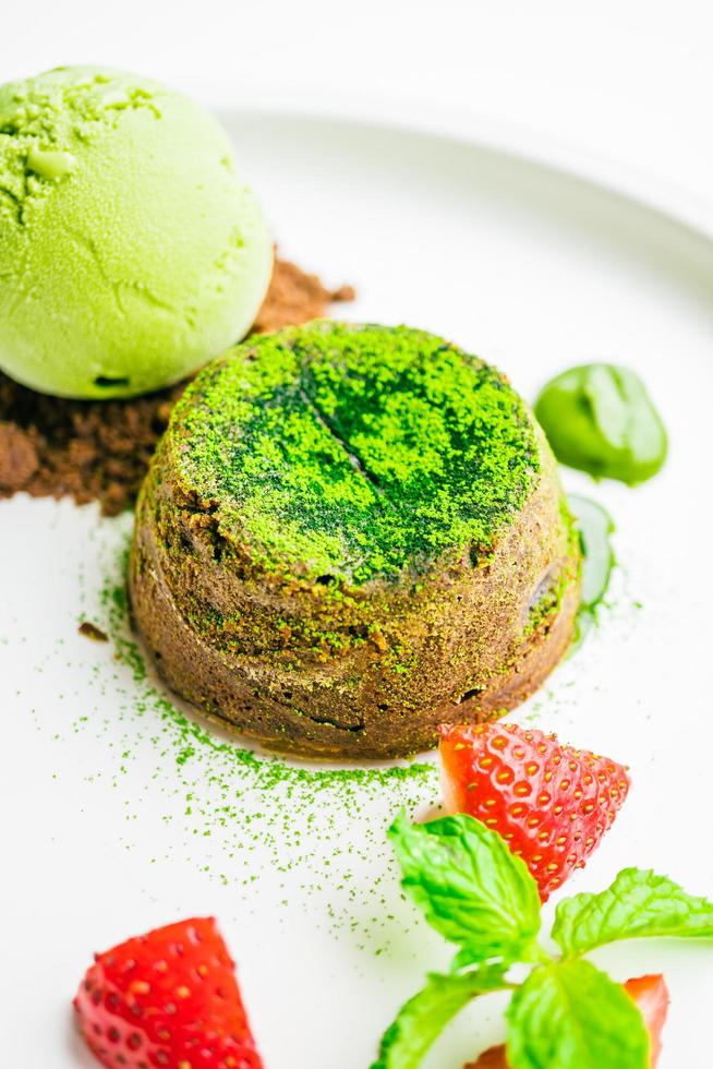 Green tea chocolate lava with ice cream and strawberry photo