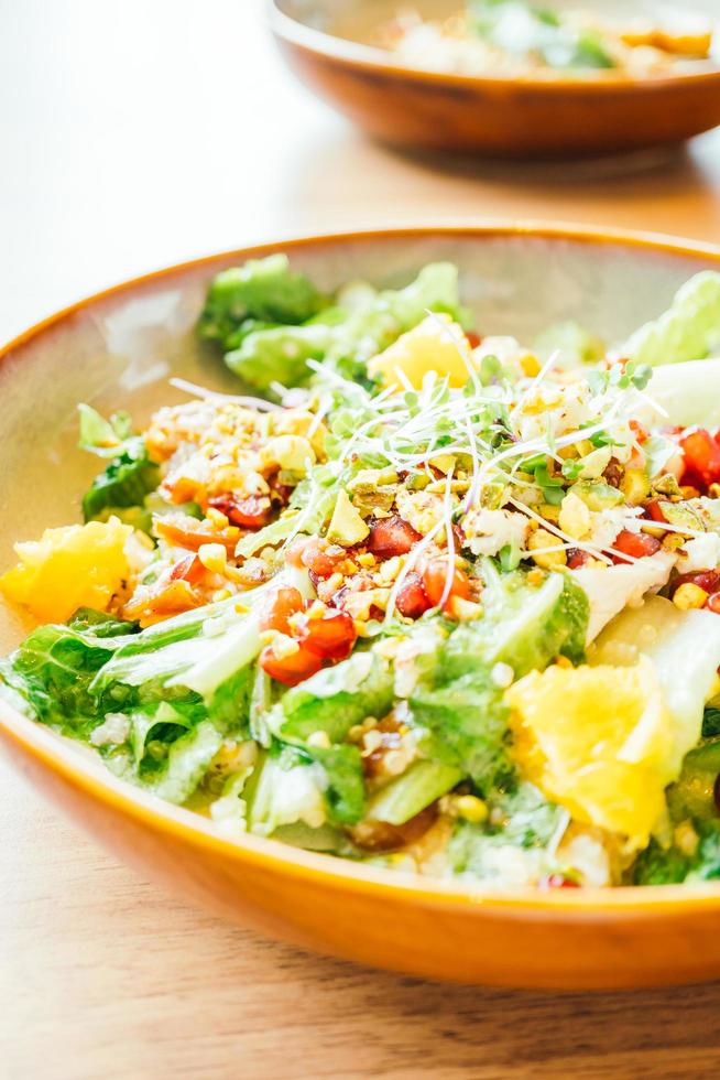 Grilled chicken with vegetable and pomegranate , fruits salad in plate - Color Filter Processing photo