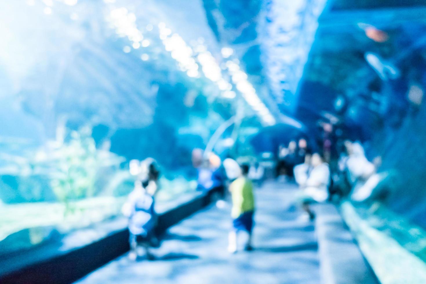 Abstract blur and defocused underwater of aquarium tunnel tank photo