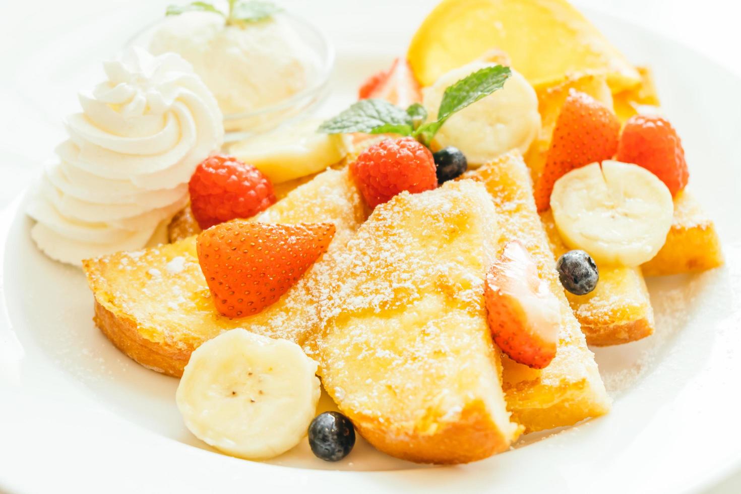 Pancake and Bread toast with mixed fruit photo