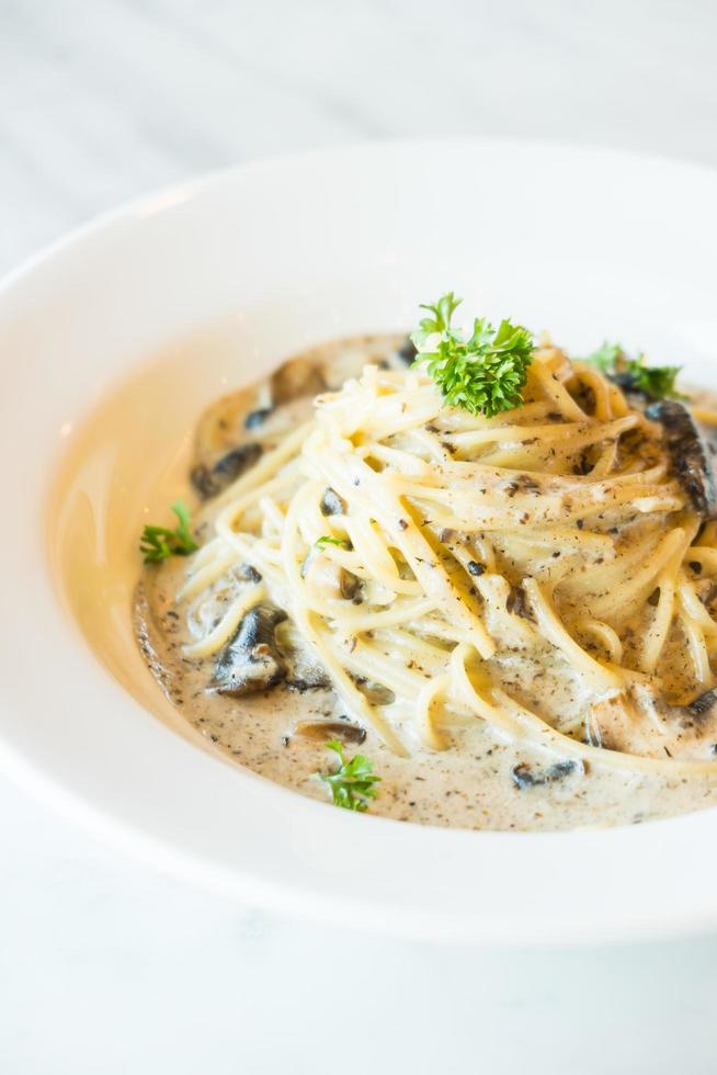 Spaghetti cream sauce with truffle mushroom photo