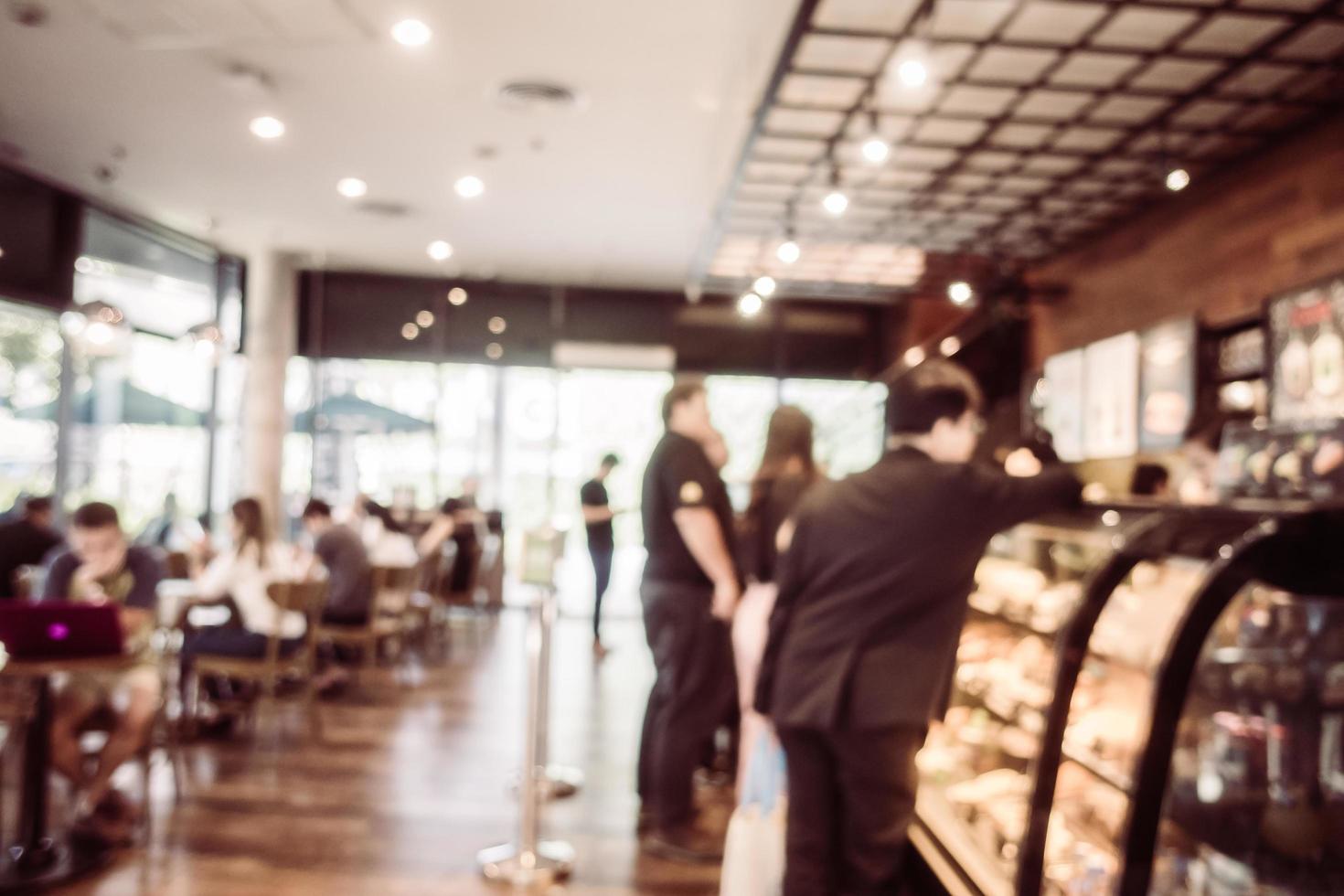 Abstract blur and defocused coffee shop interior photo