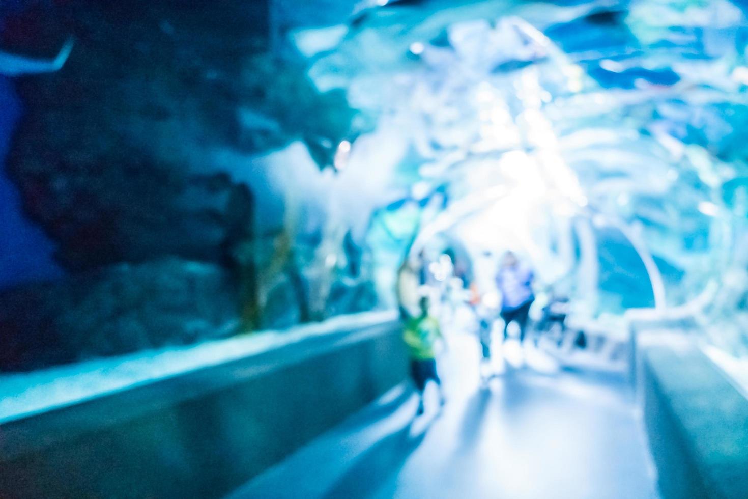Abstract blur and defocused underwater of aquarium tunnel tank photo