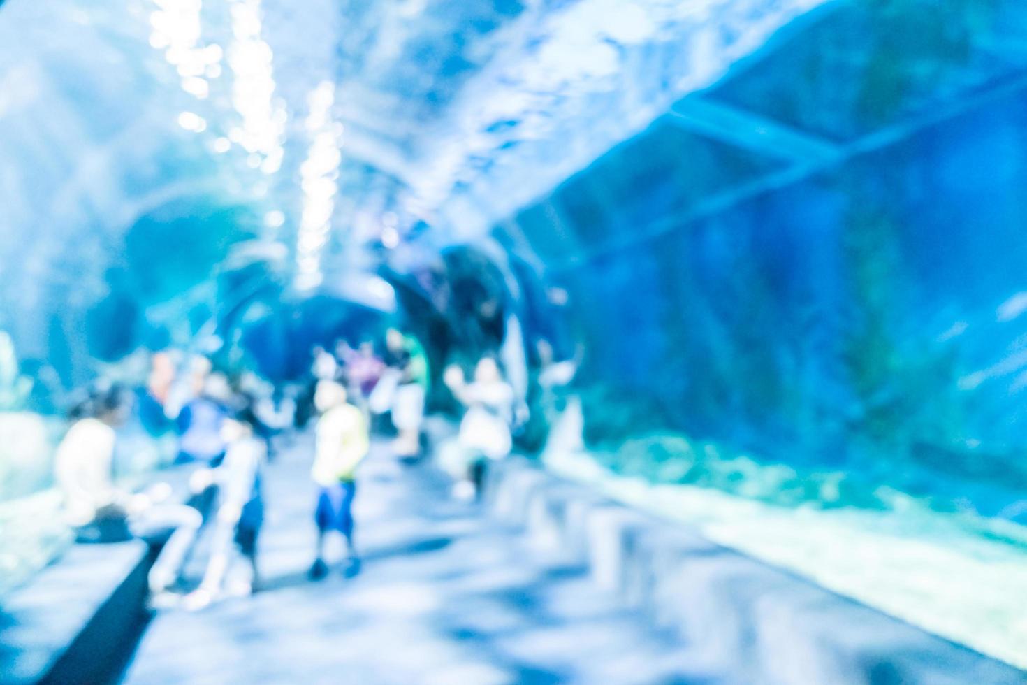 Abstract blur and defocused underwater of aquarium tunnel tank photo