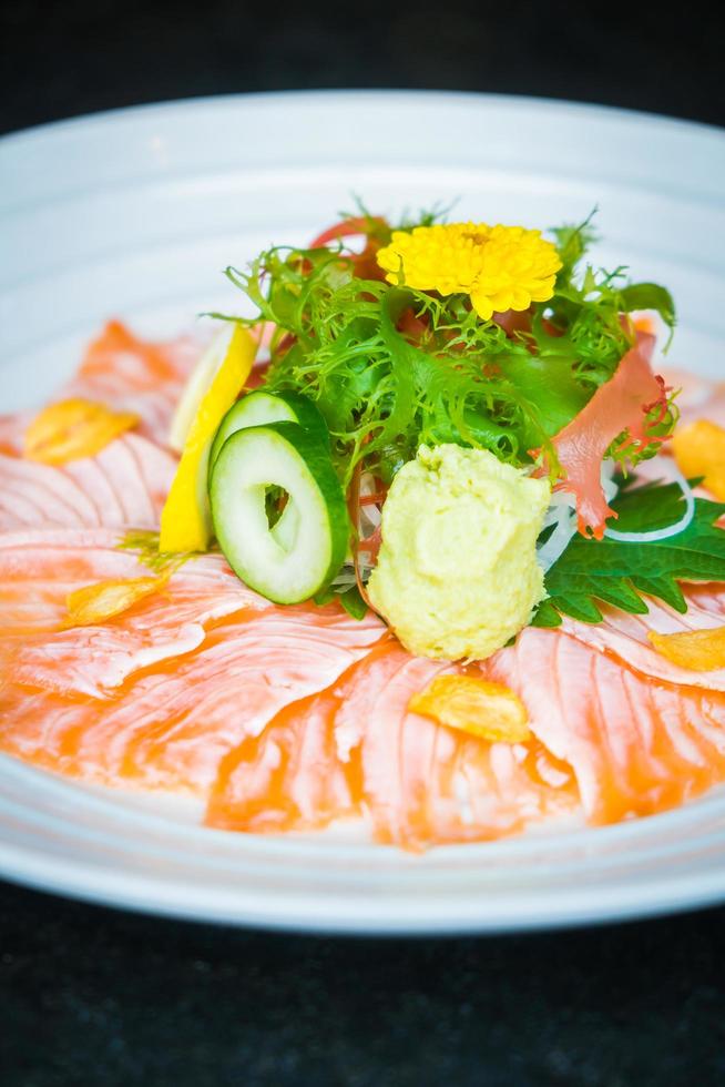 Carpaccio salmon in white plate photo