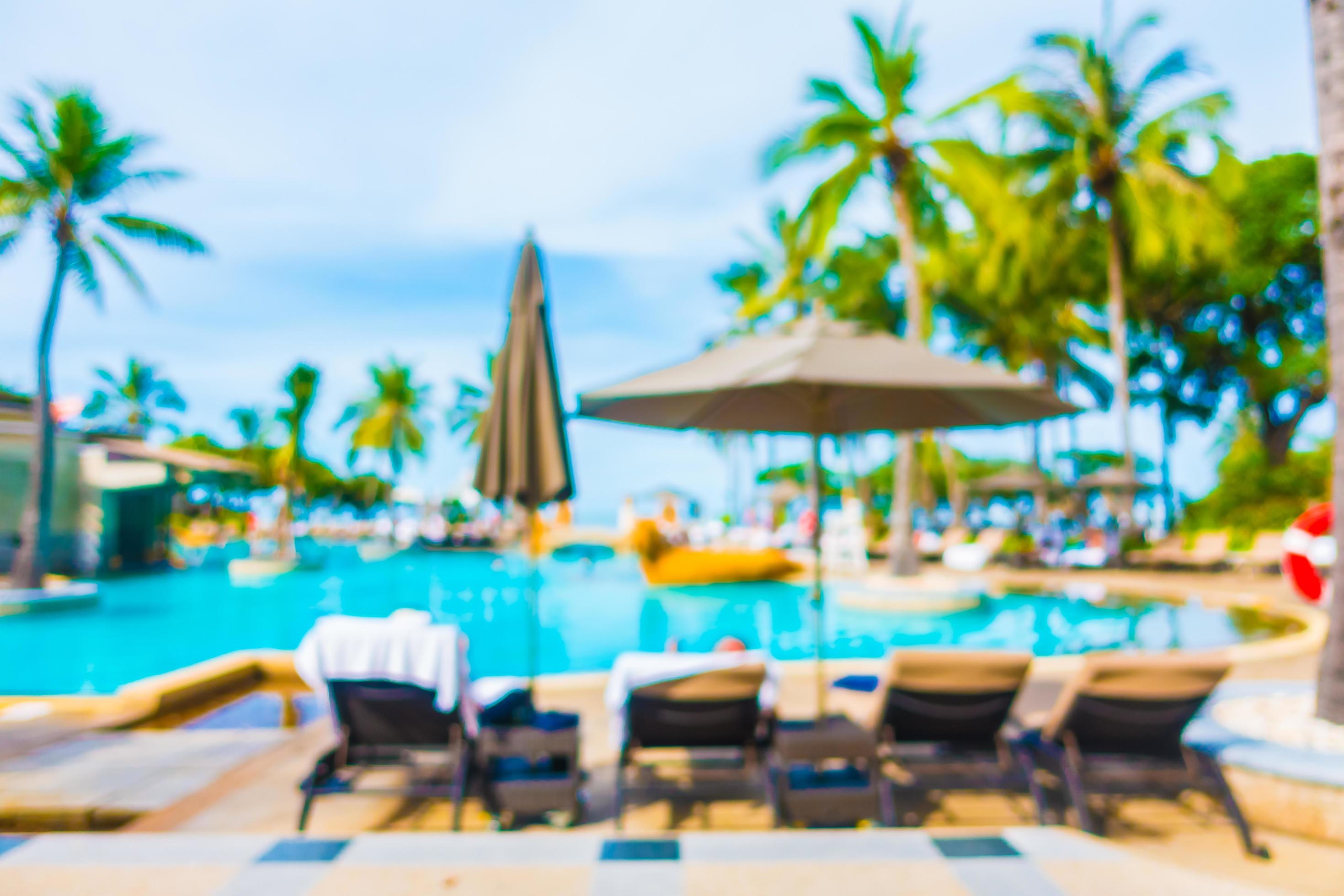 Abstract blur coconut palm tree around swimming pool 2818500 Stock