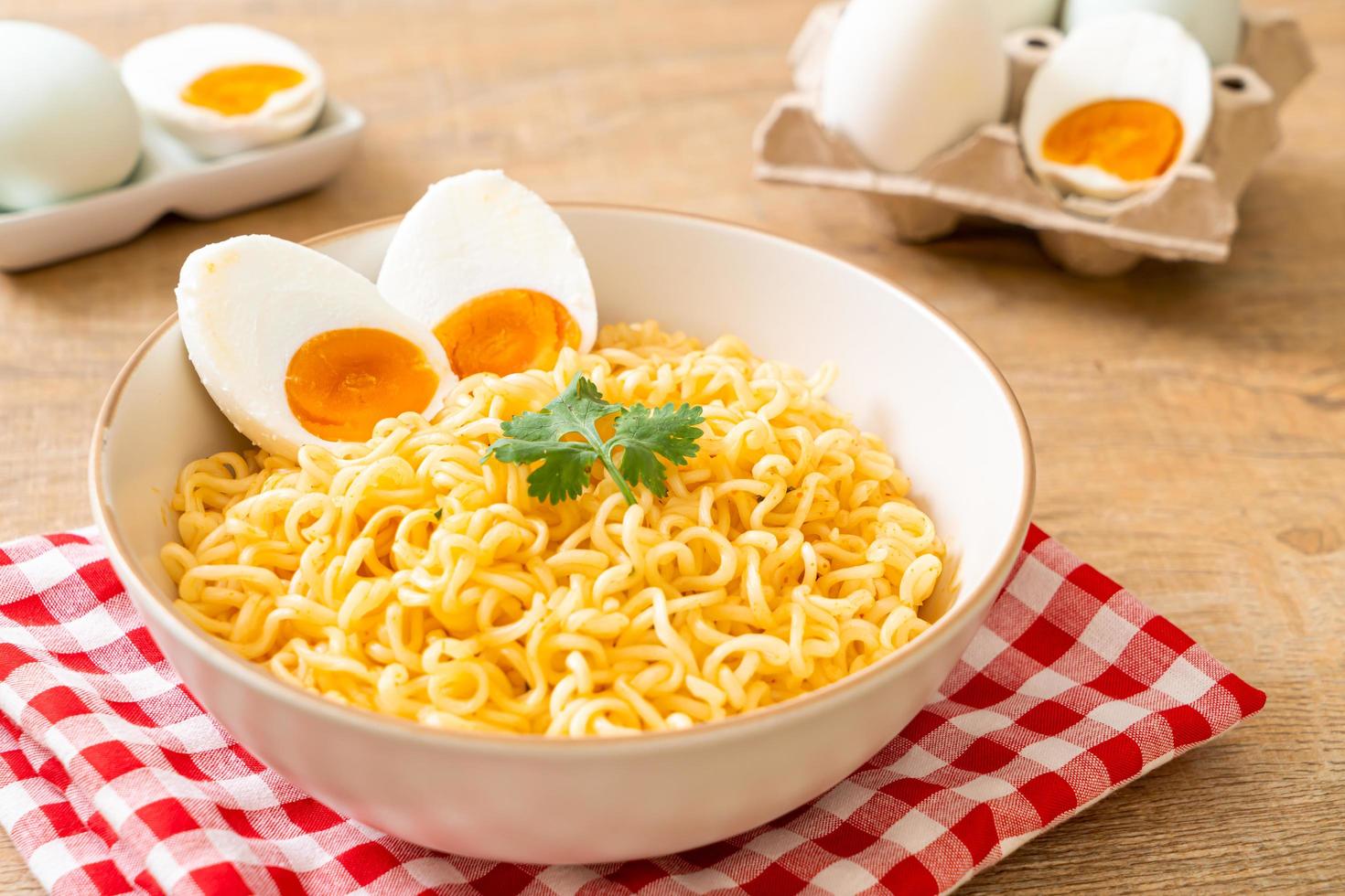 Instant noodles bowl with salt egg photo