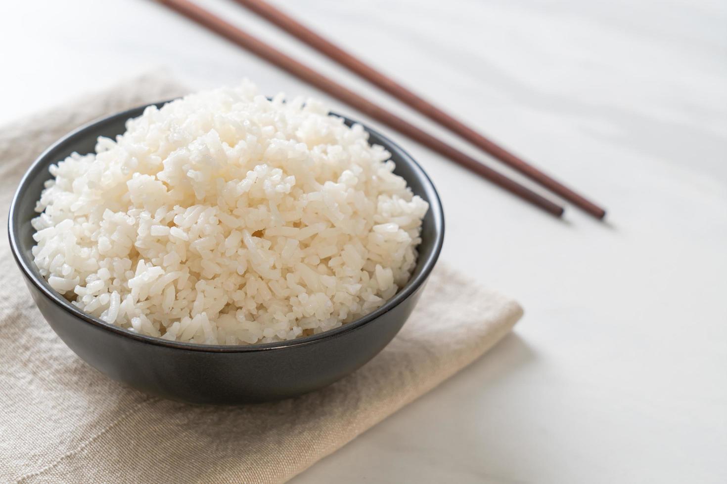 Cooked Thai jasmine white rice bowl photo