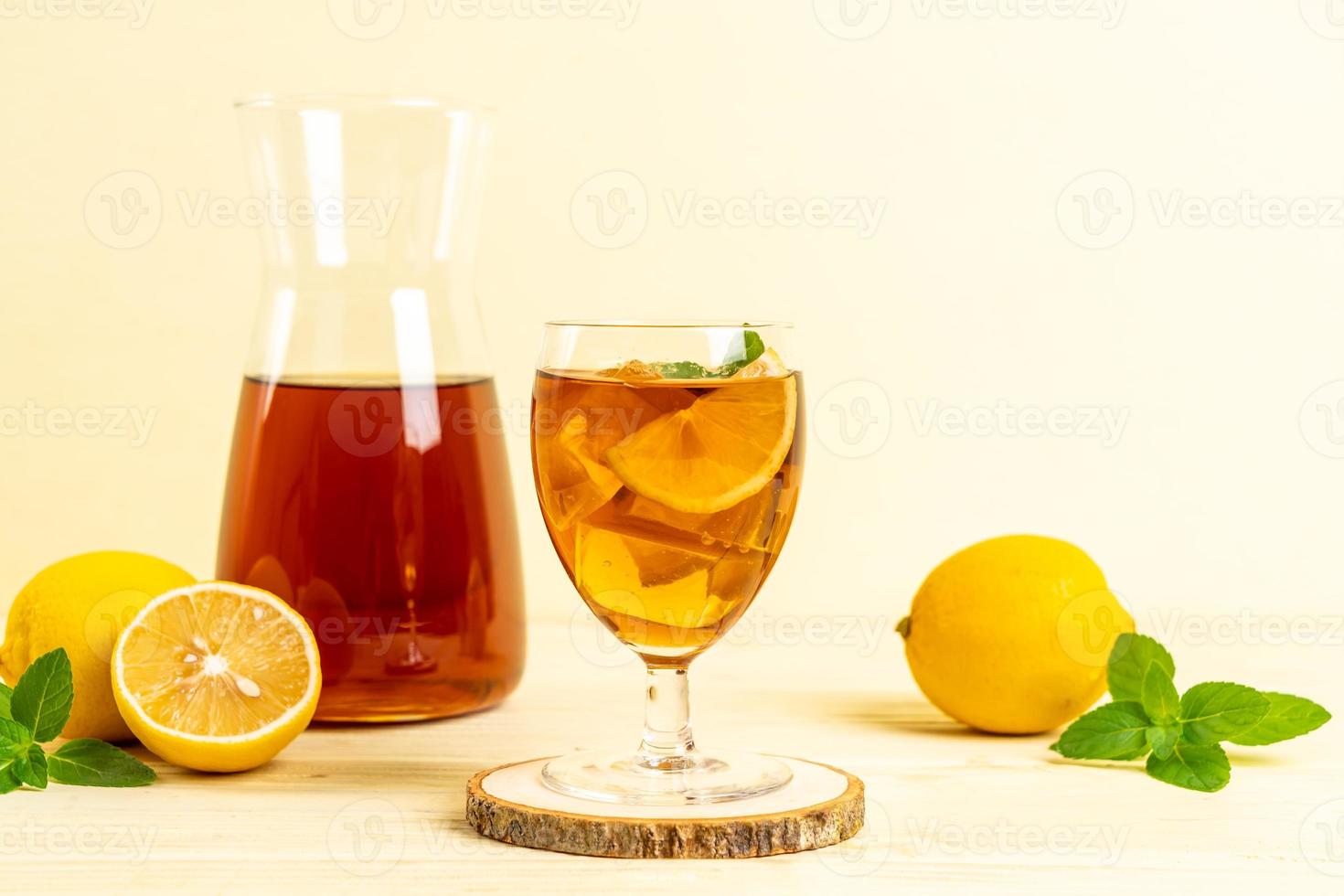 Glass of ice lemon tea with mint photo