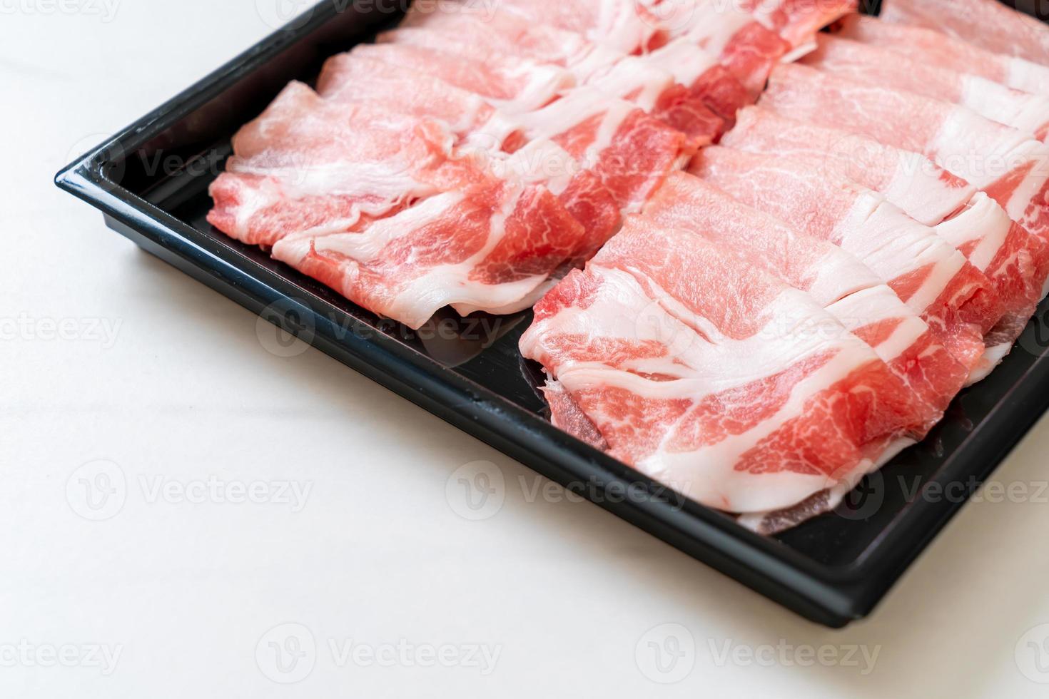 Fresh raw pork sirloin sliced photo