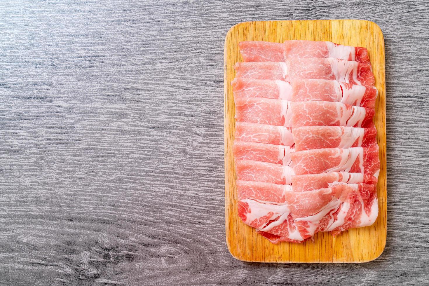 Fresh raw pork sirloin sliced photo