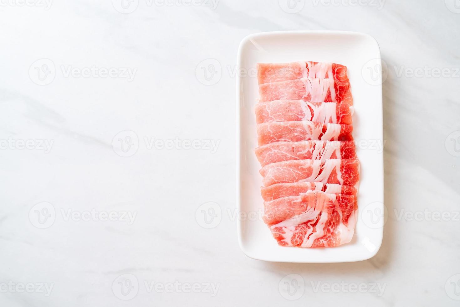 Fresh raw pork sirloin sliced photo