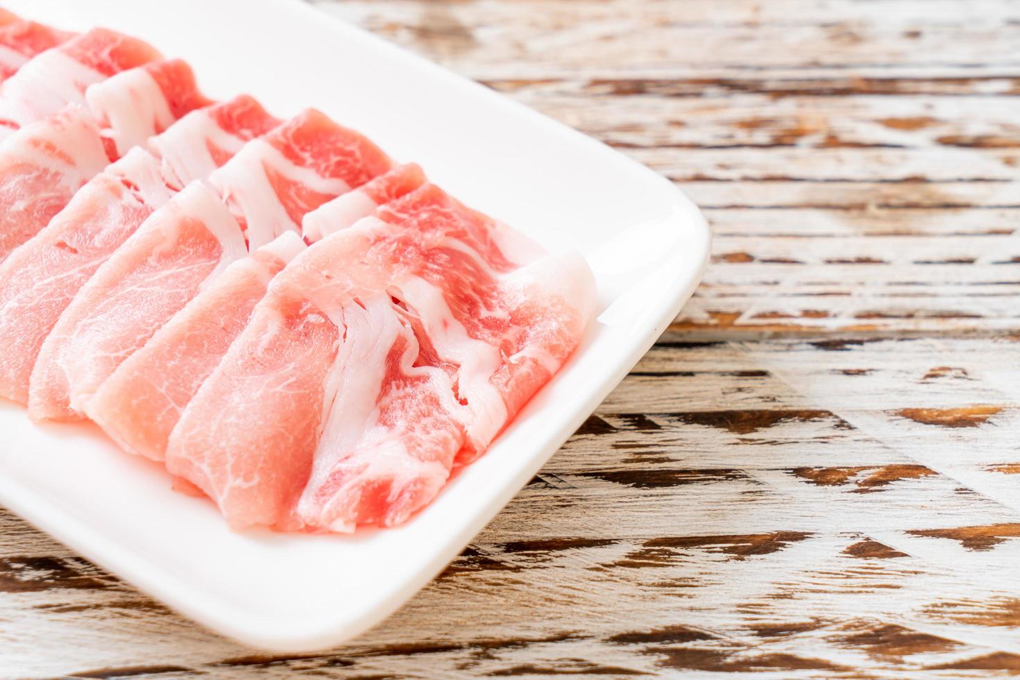 Fresh raw pork sirloin sliced photo