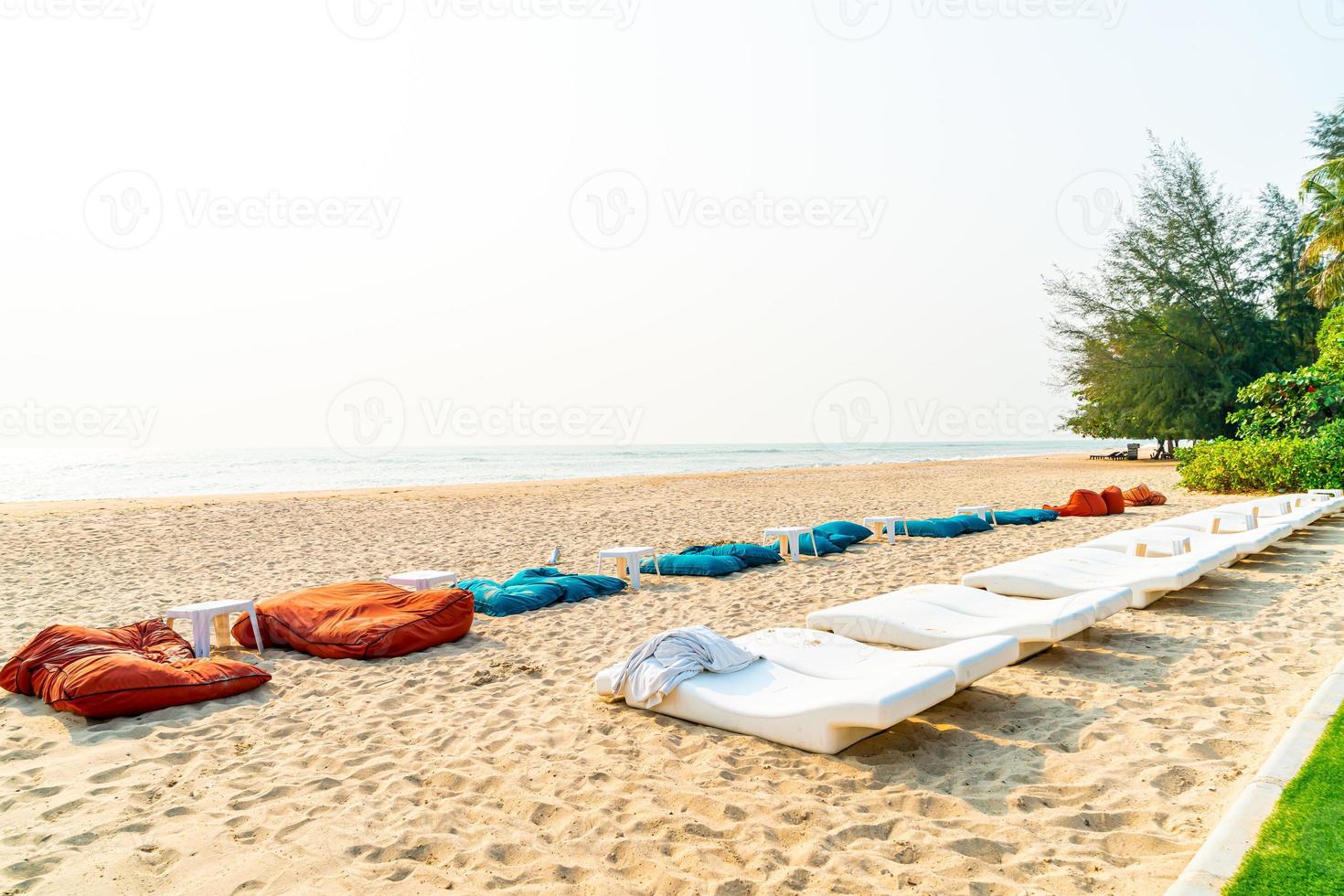 Beach bean bags with ocean sea background photo