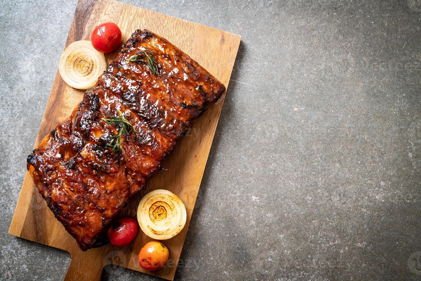 Grilled and barbecue ribs pork photo