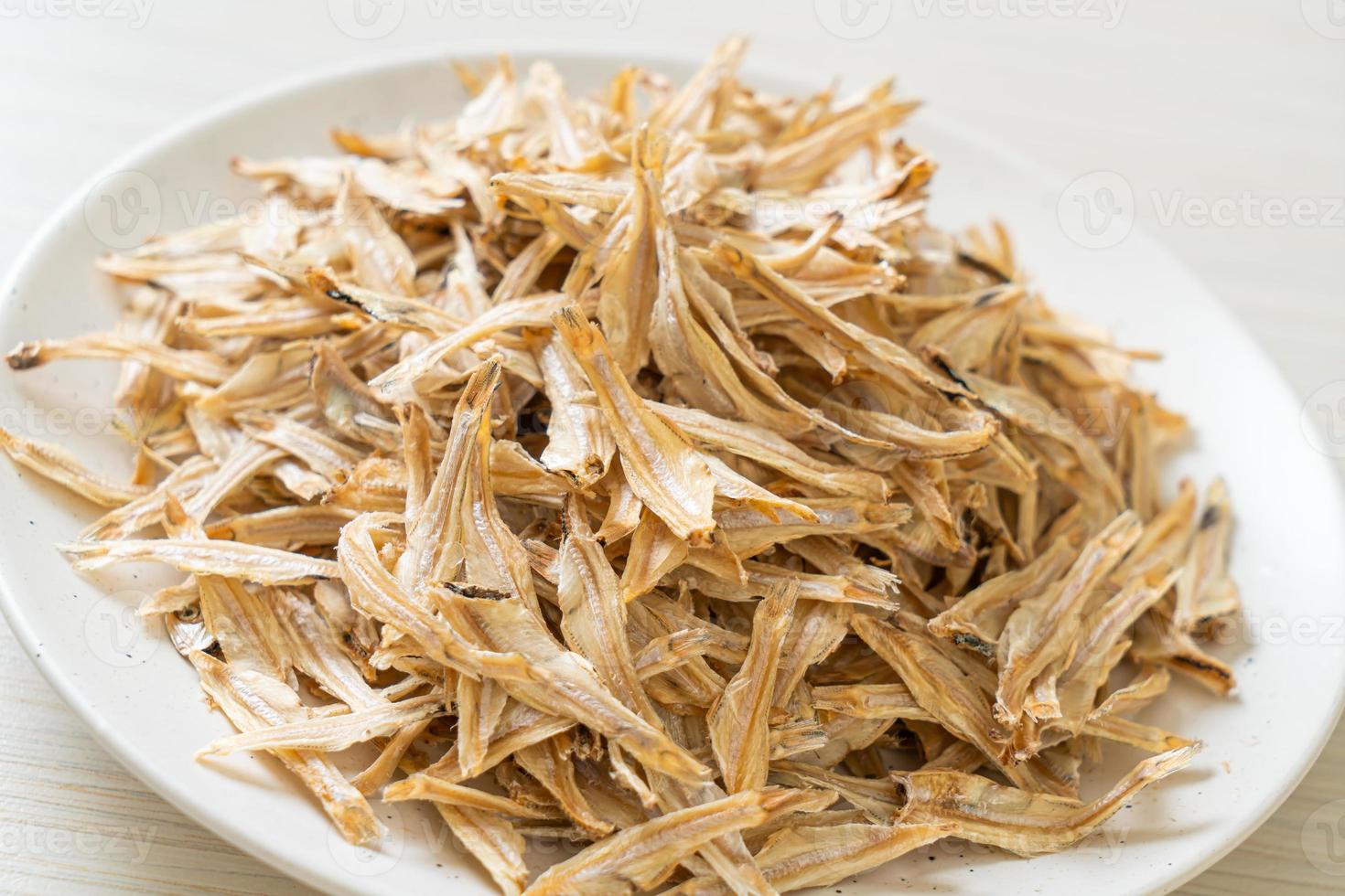 Dried small crispy baked fish photo