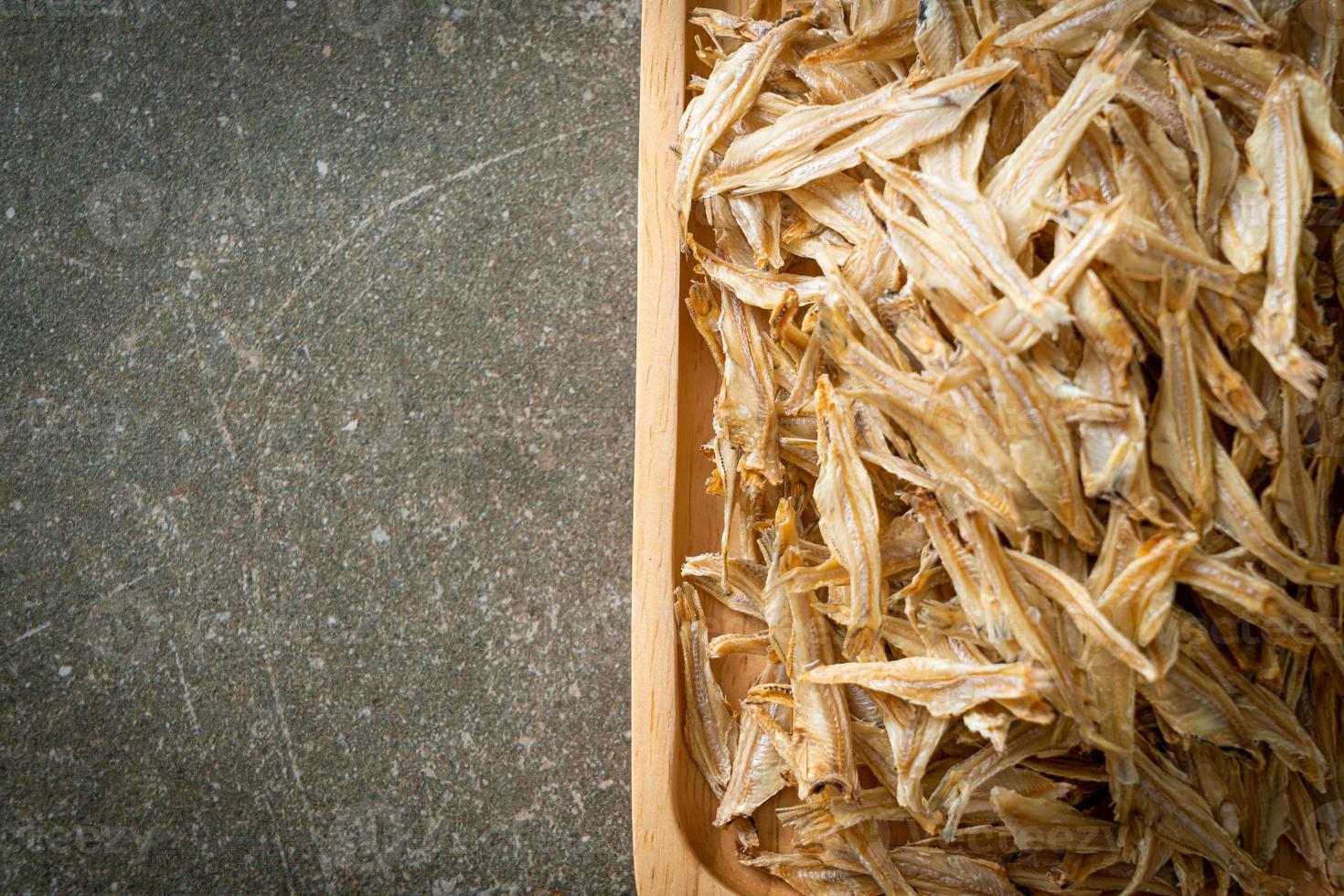 Dried small crispy baked fish photo