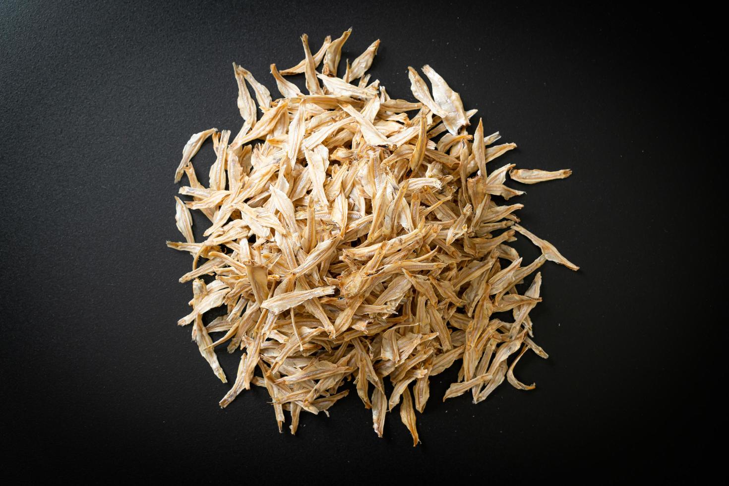 Dried small crispy baked fish photo