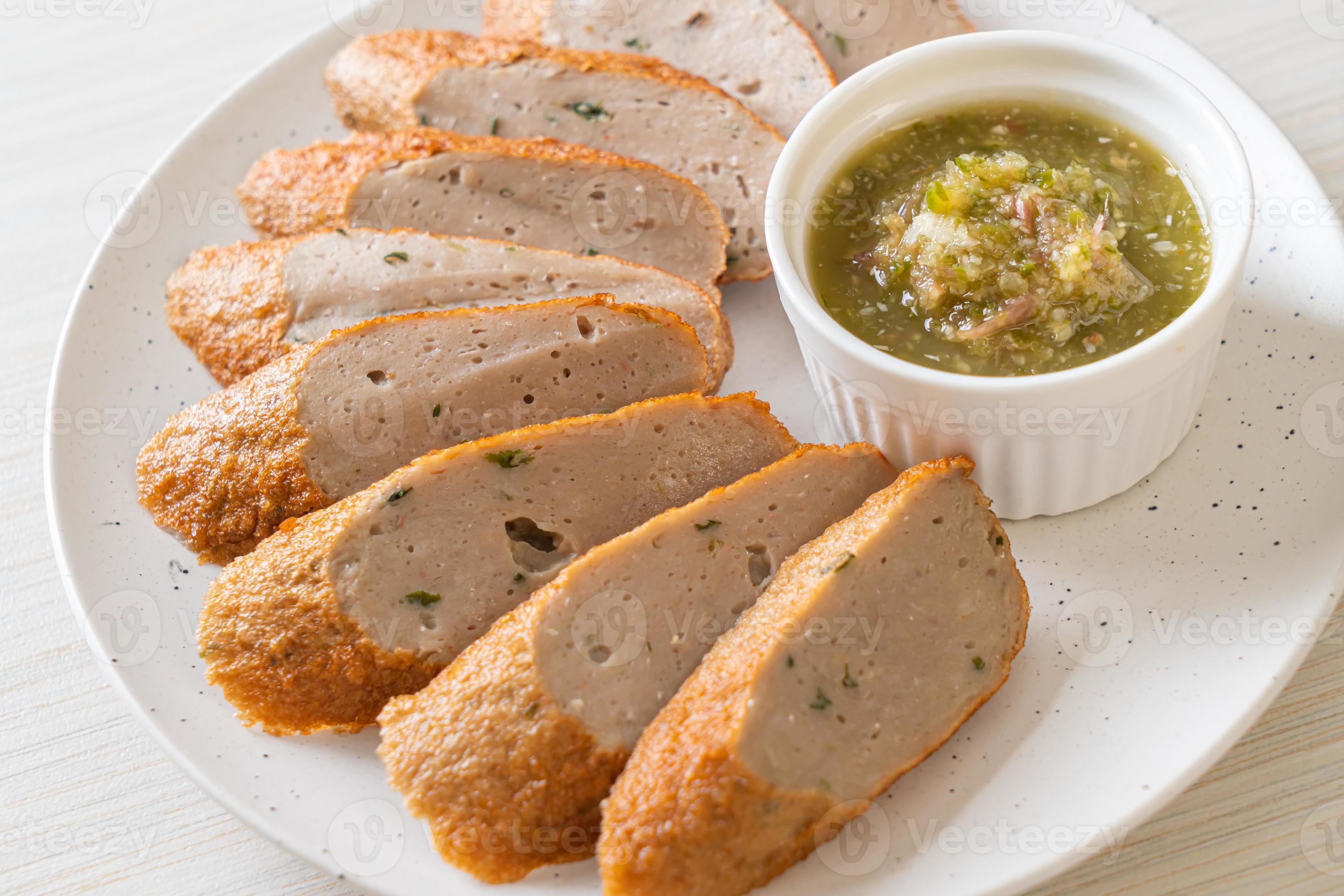 Fried Chinese fish cake or fish ball line sliced with spicy seafood