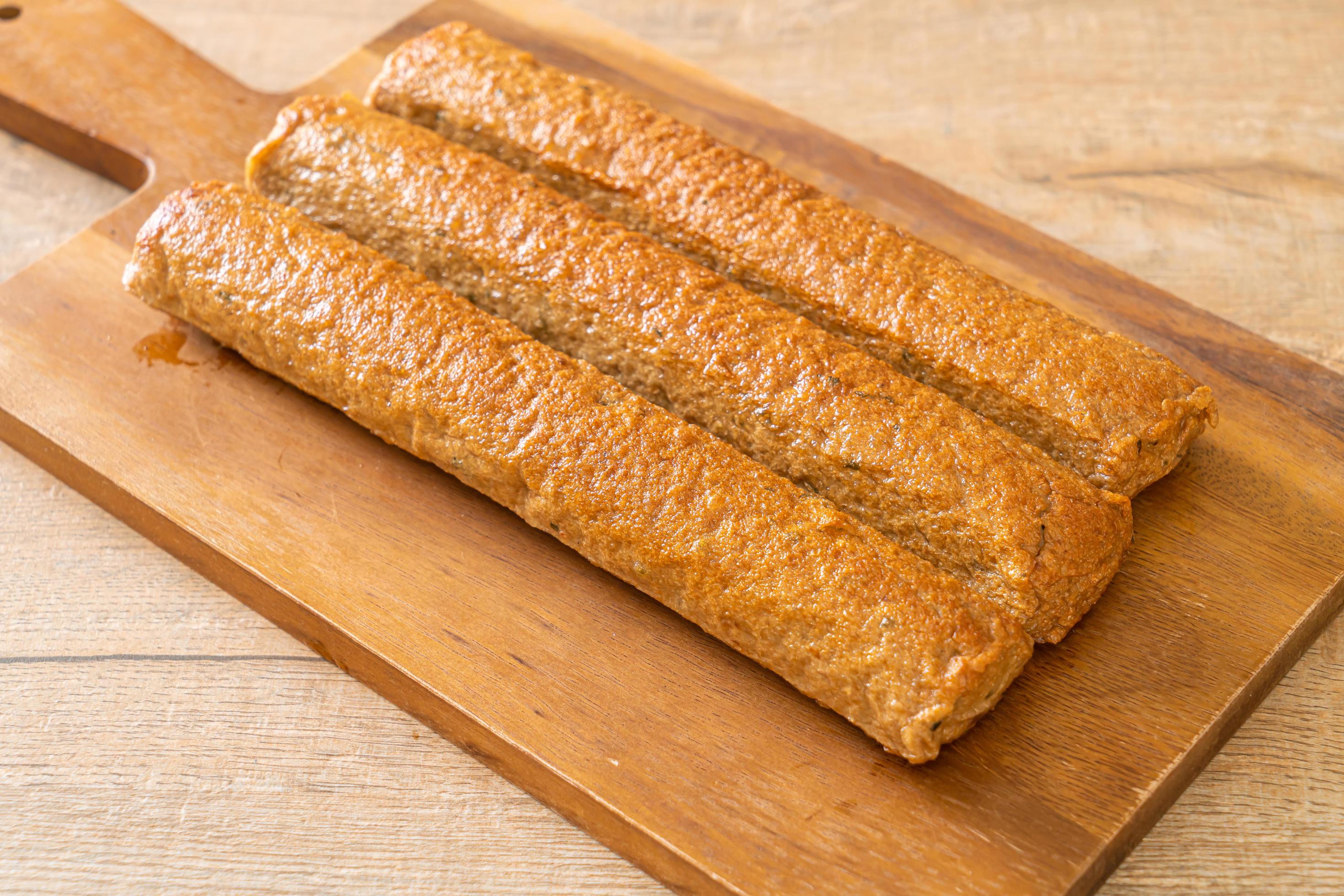 Fried Chinese fish cake or fish ball line on wood board 2821793 Stock