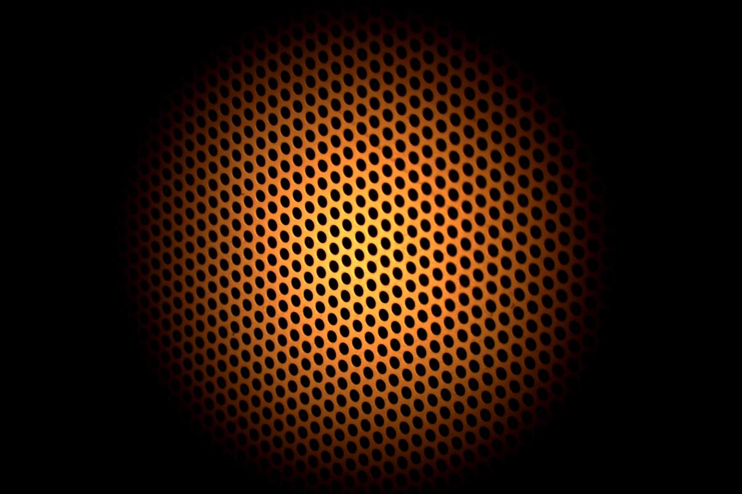 An abstract orange mesh on black background photo