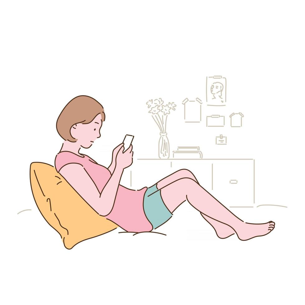 una mujer está sentada en su cama y mira su teléfono. ilustraciones de diseño de vectores de estilo dibujado a mano.