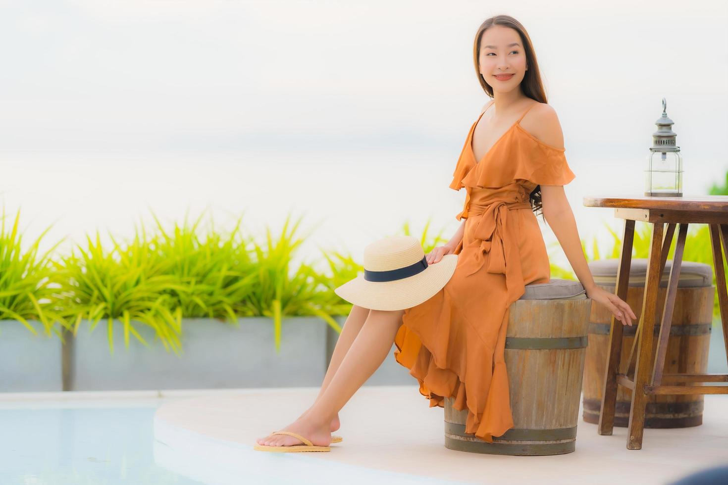 Portrait beautiful young asian woman lifestyle happy smile with leisure nearly sea beach ocean photo