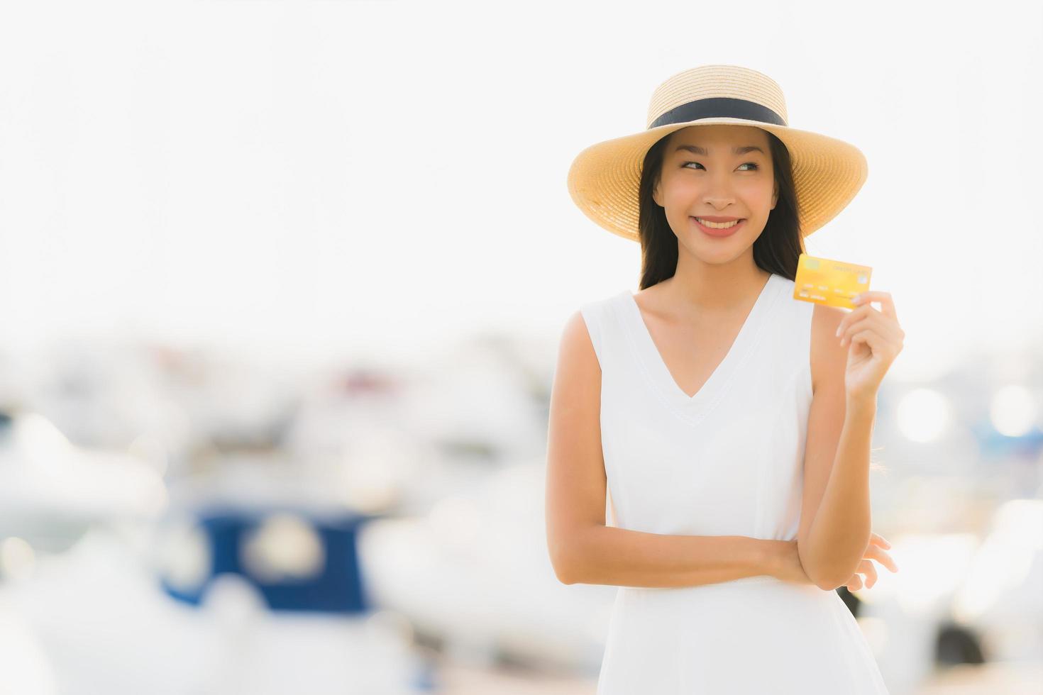 Portrait beautiful young asian woman leisure smile happy relax around yacht port photo