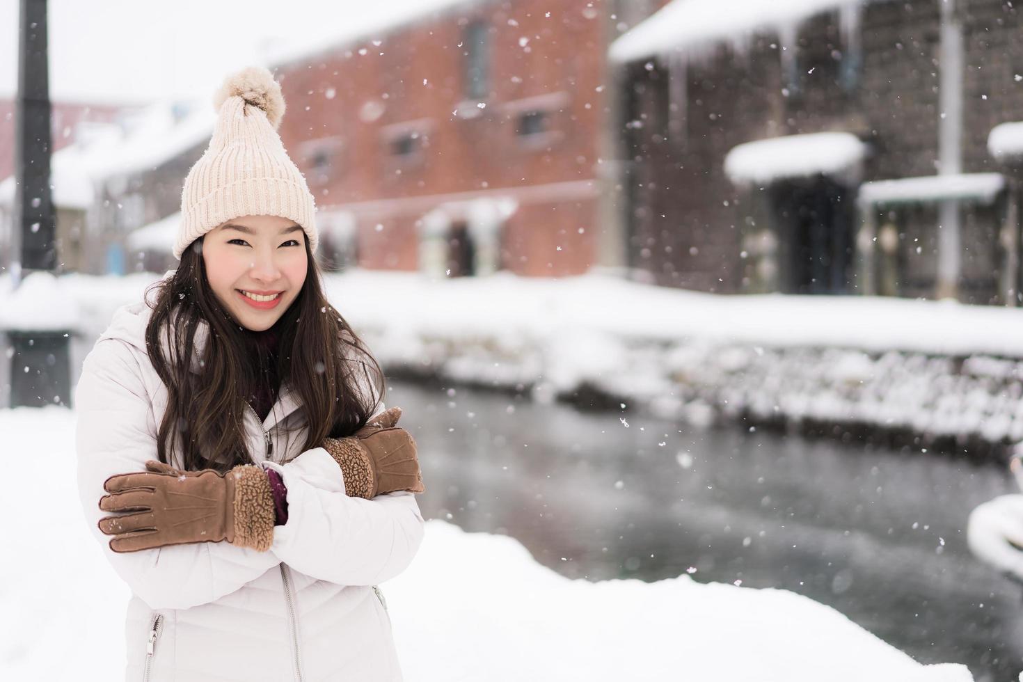 Beautiful young asian woman smile and happy with travel trip in Otaru ...