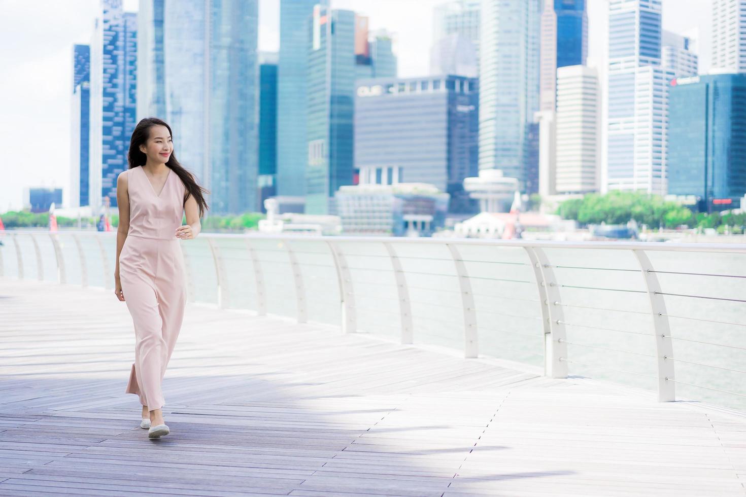 Asian woman using smartphone or mobile phone for talking or text photo