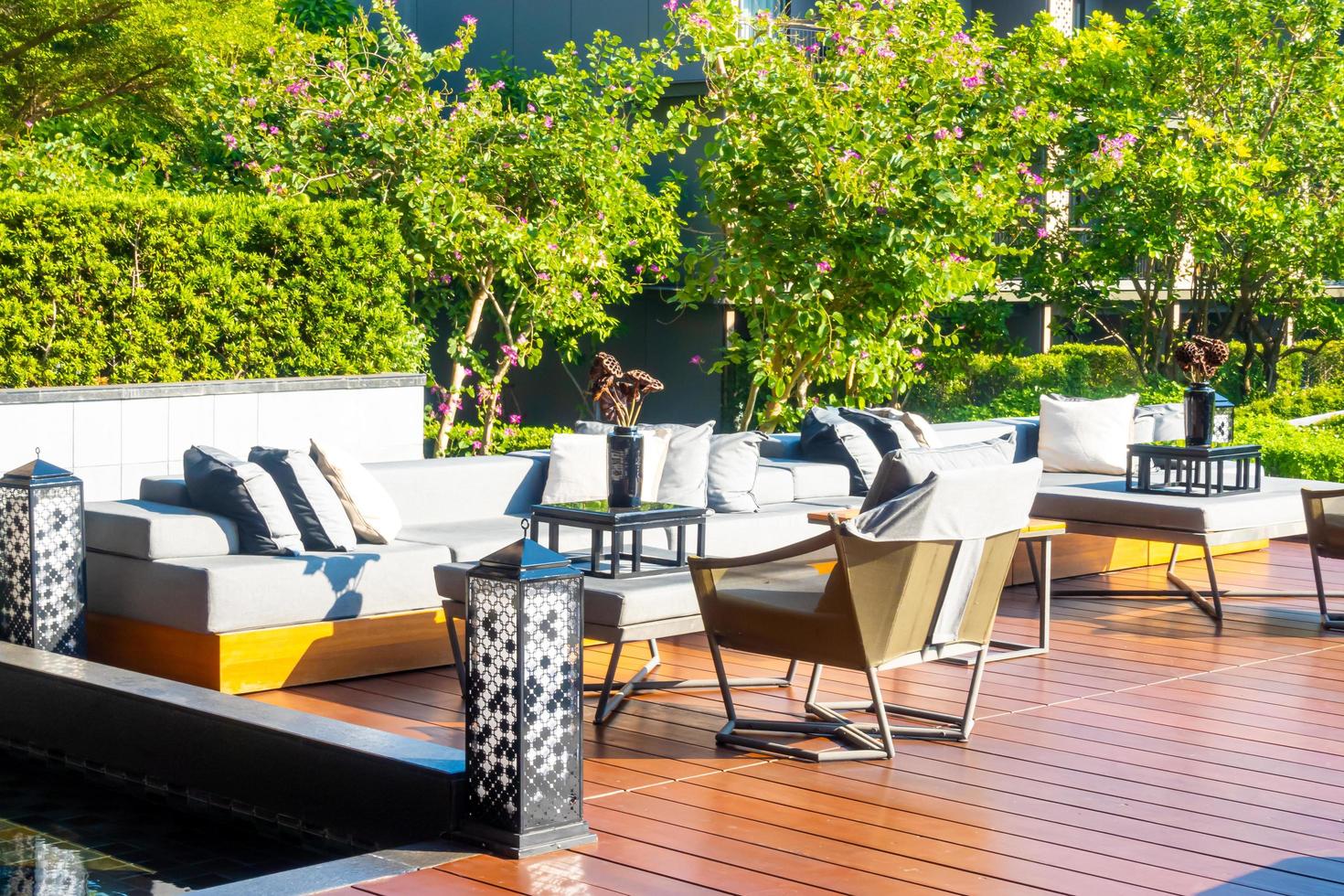 Pillows with outdoor patio deck and sofa on the balcony in a garden photo