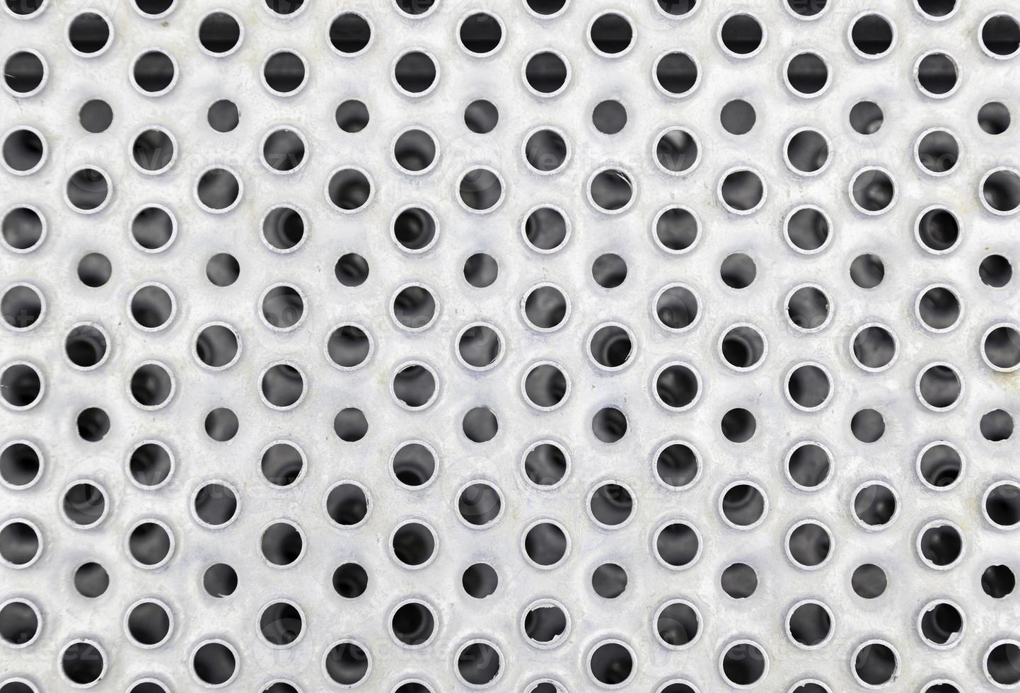 Metal plate with holes photo