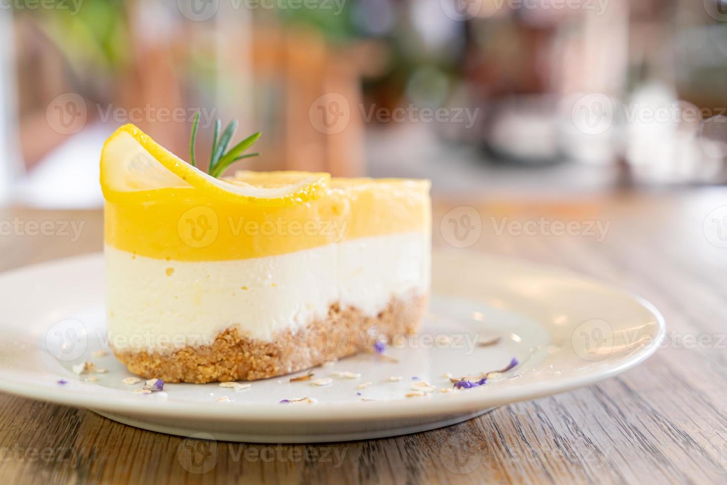 Lemon cheese cake on plate in cafe and restaurant photo