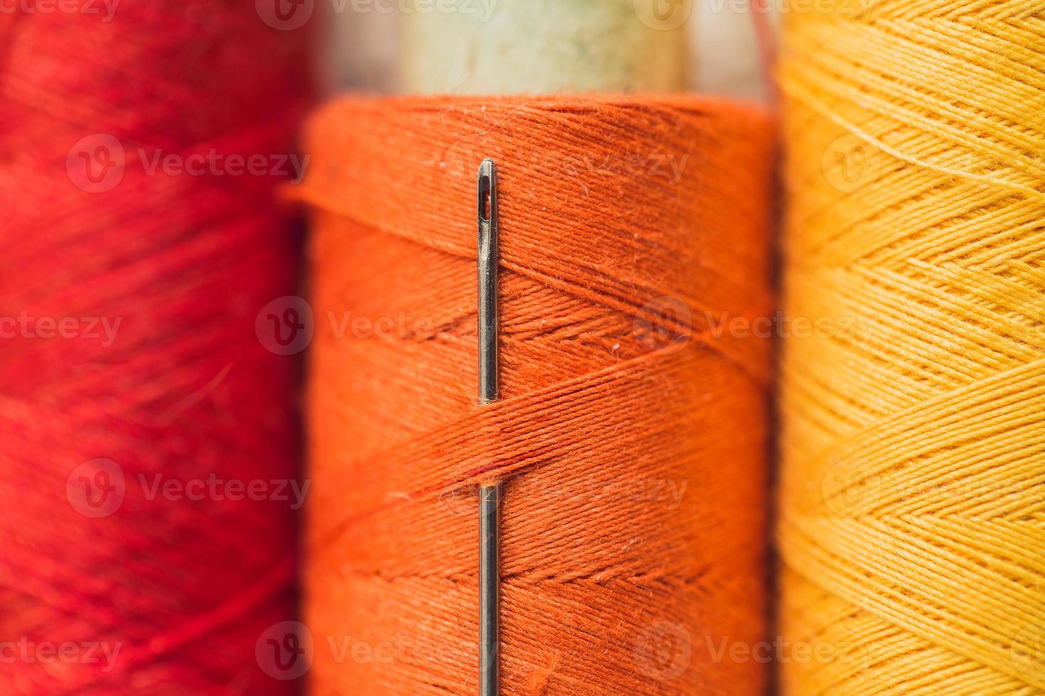 Reinforced sewing thread on a spool - durable polyester lavsan core with outer cotton or polyester braid - high seam strength with high heat resistance photo