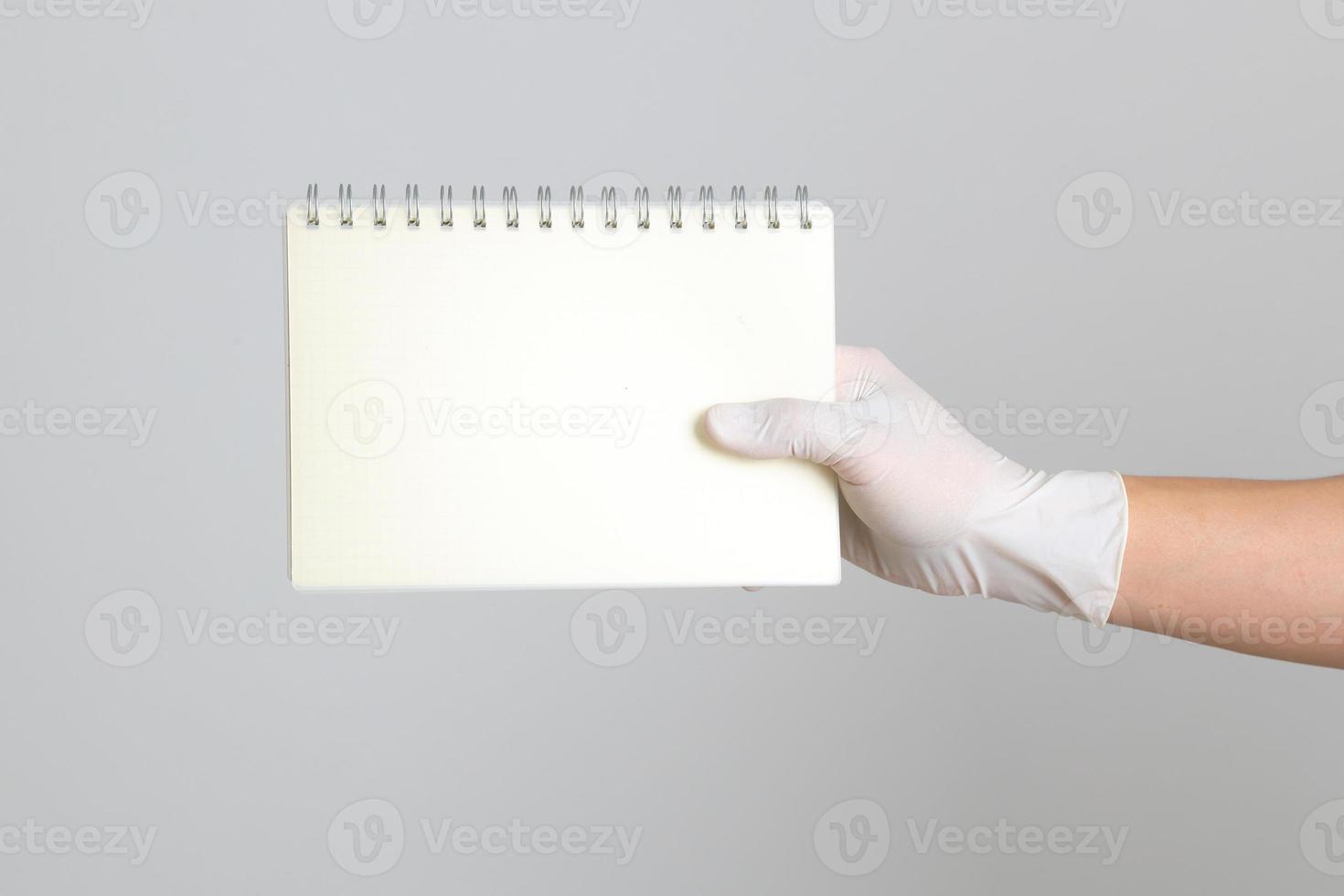 Hand with Medical Gloves photo