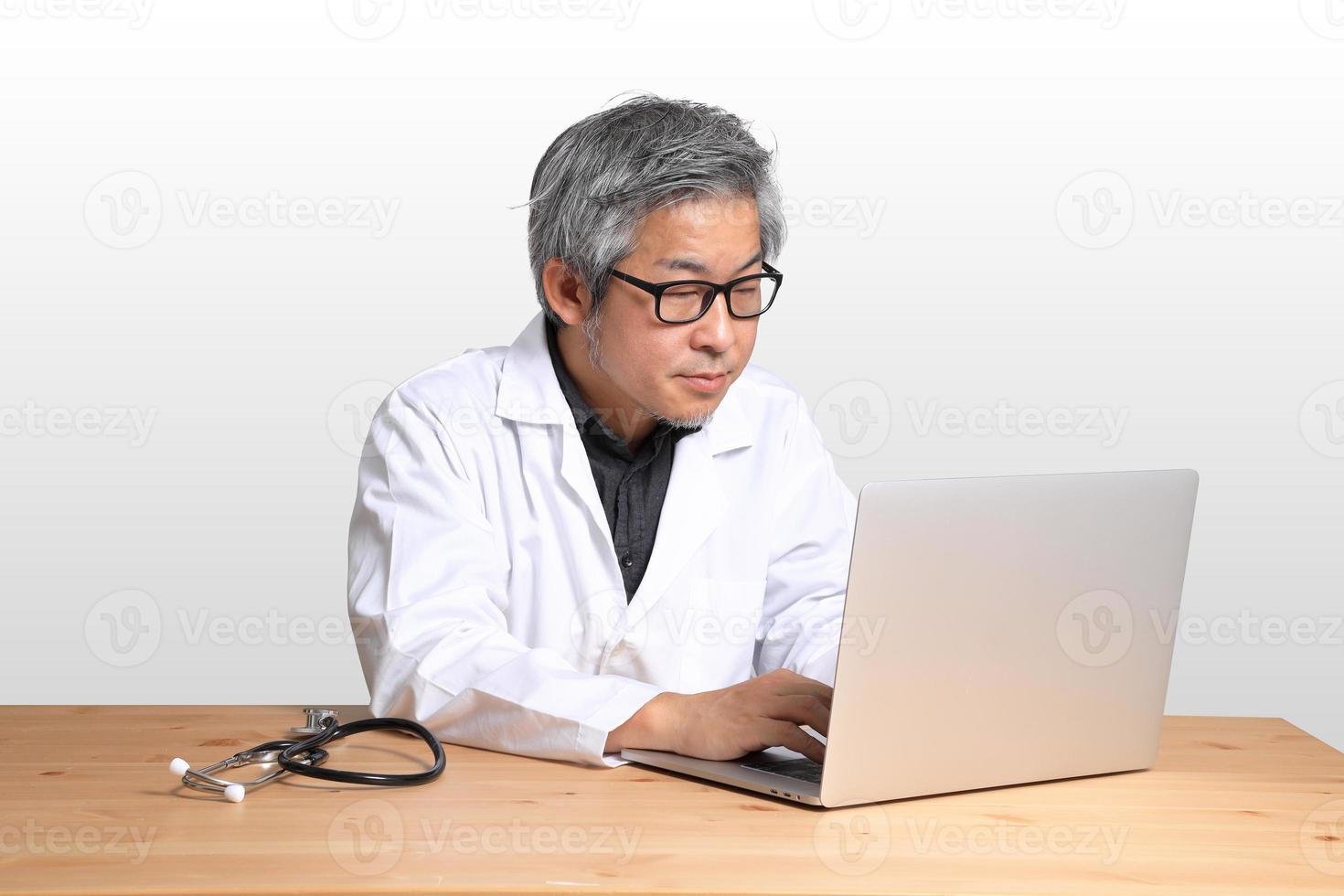 Asian Man Sitting photo