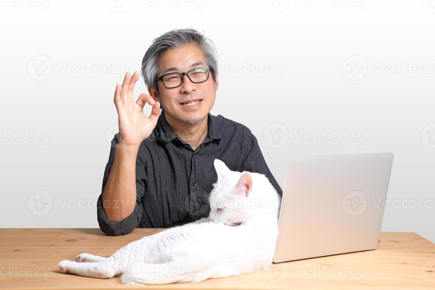 Asian Man Sitting photo