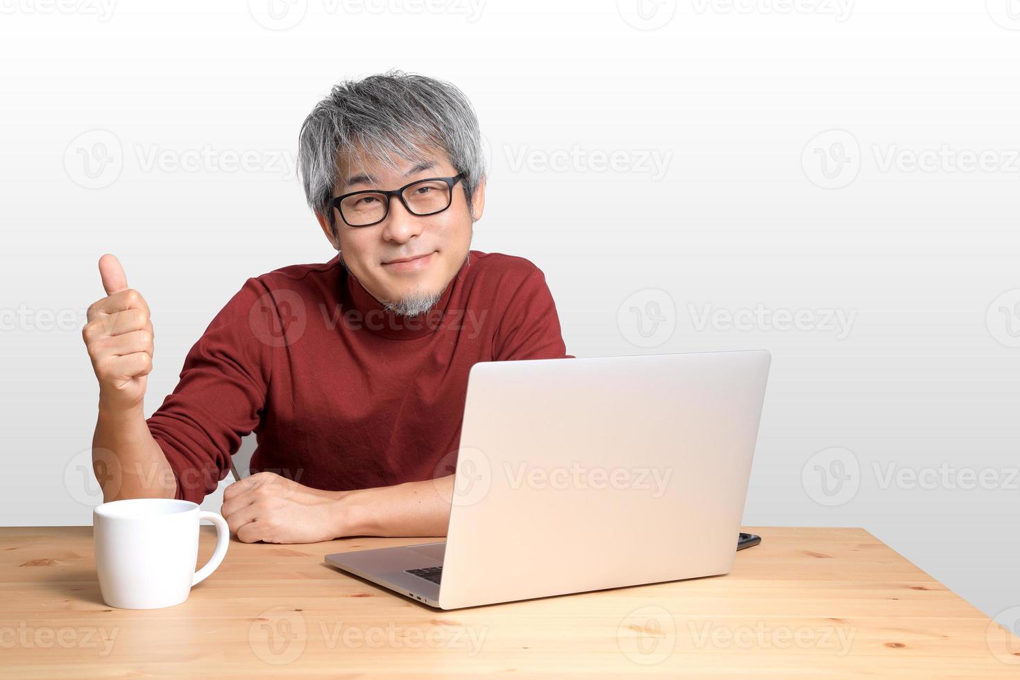 Asian Man Sitting photo