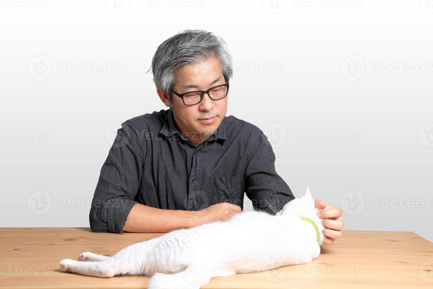 Asian Man Sitting photo