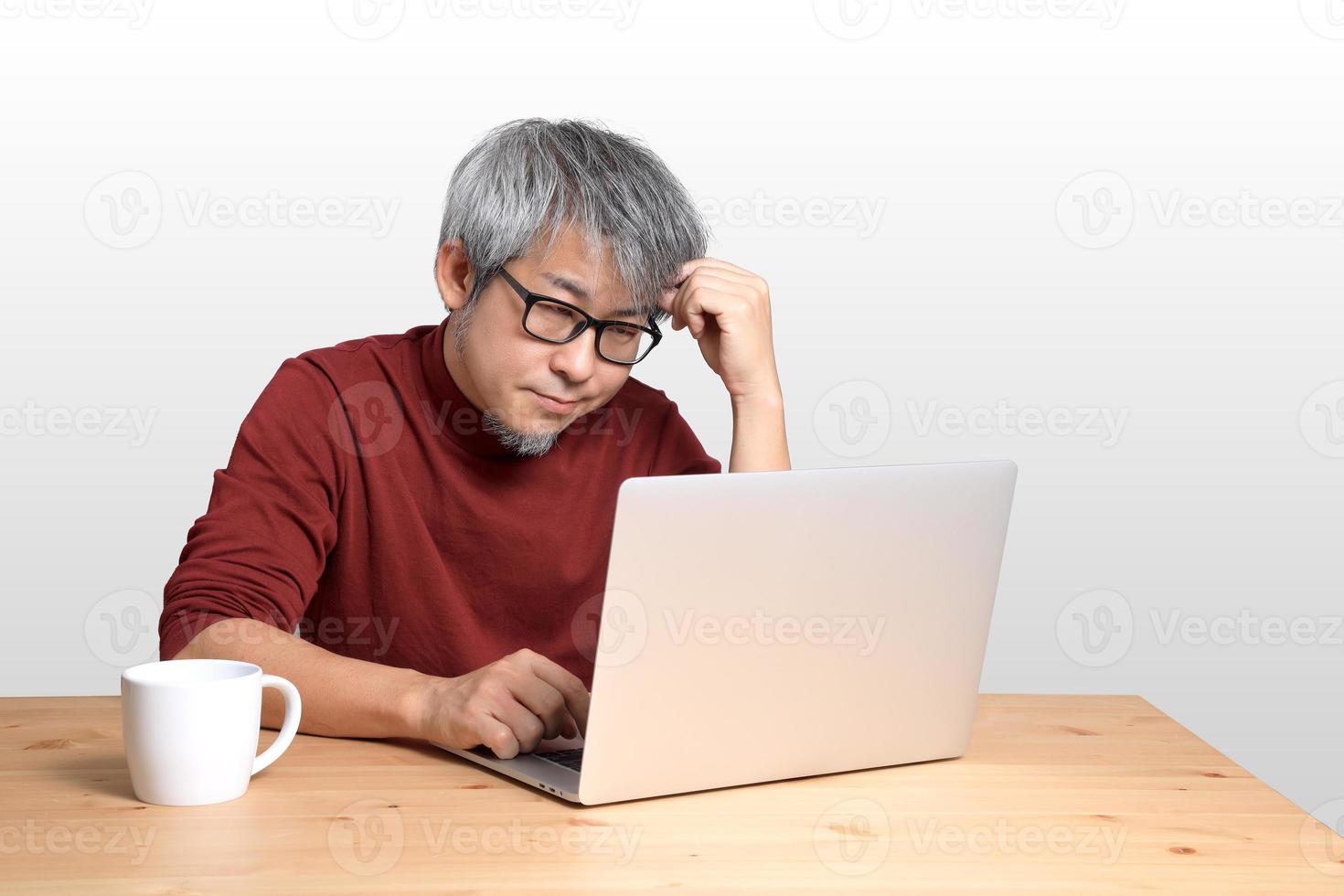 Asian Man Sitting photo