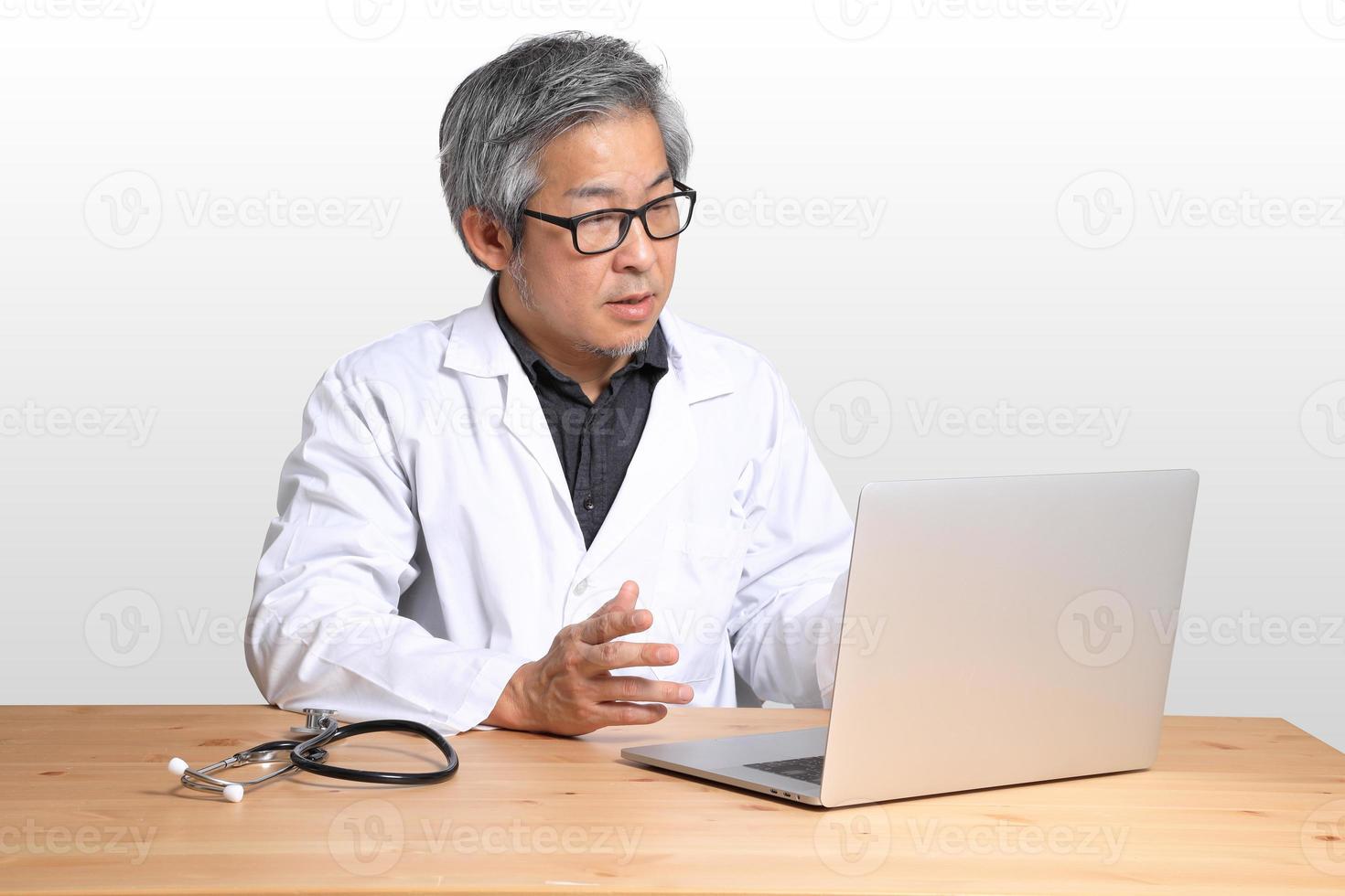 Asian Man Sitting photo